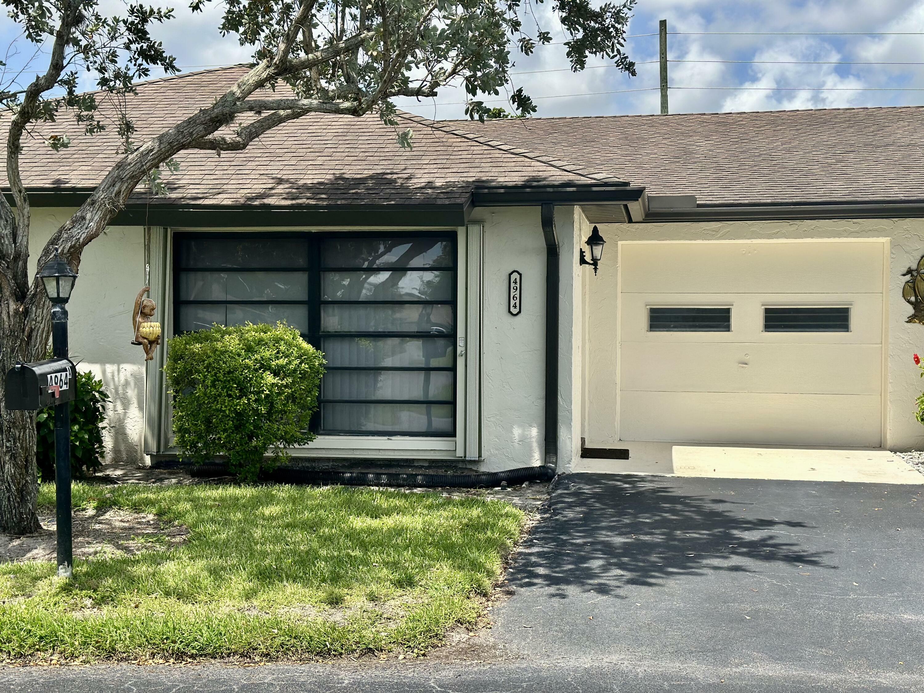 Property Photo:  4964 Eaglewood Road A  FL 33436 