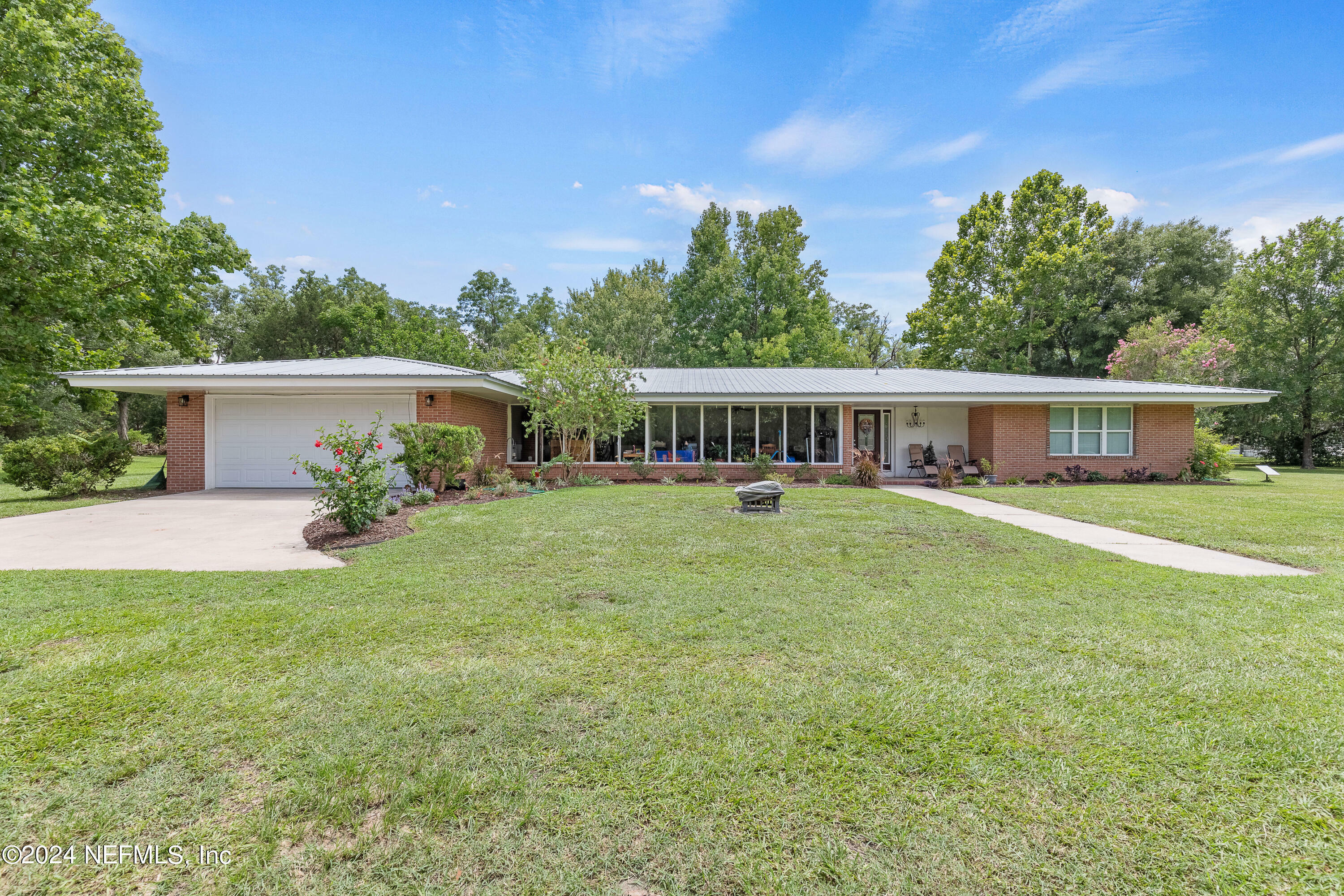 Property Photo:  7406 SW County Road 225  FL 32091 