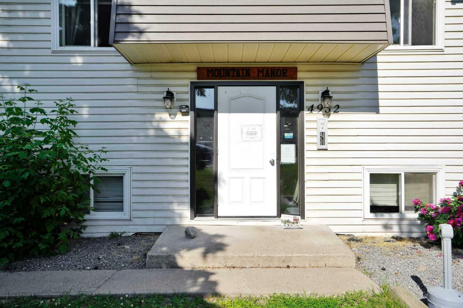 Property Photo:  4932 48 Street 11-14, 21-24, 31-34  AB T4T 1R1 