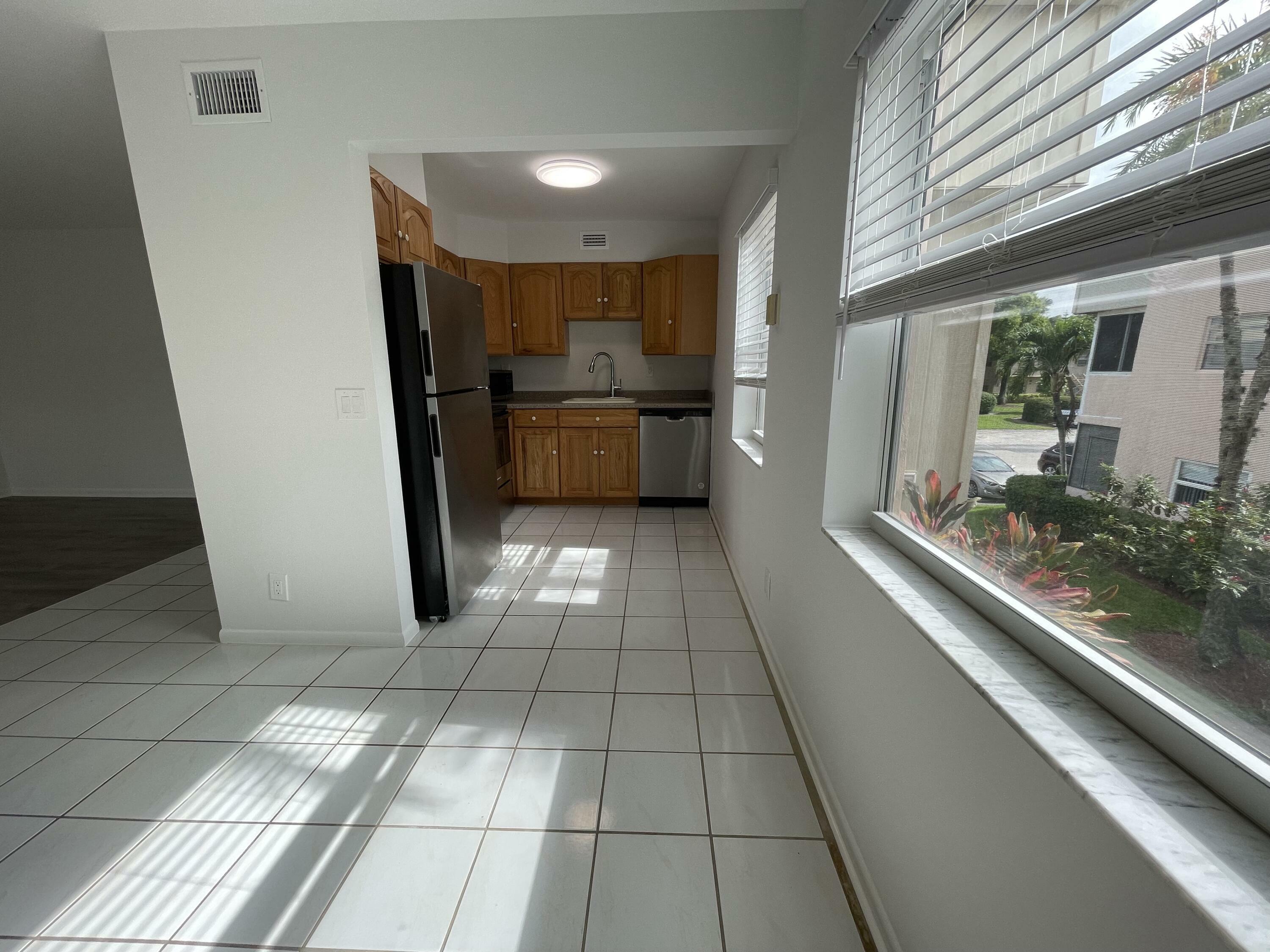 Property Photo:  380 Capri H  FL 33484 