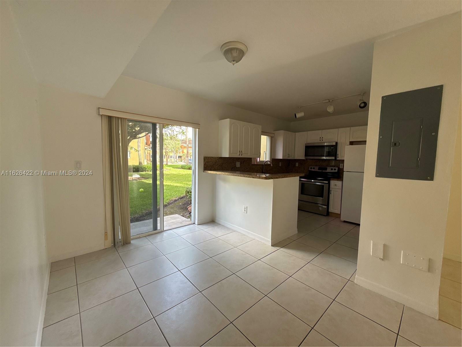 Property Photo:  935 NE 33rd Terr 104  FL 33033 