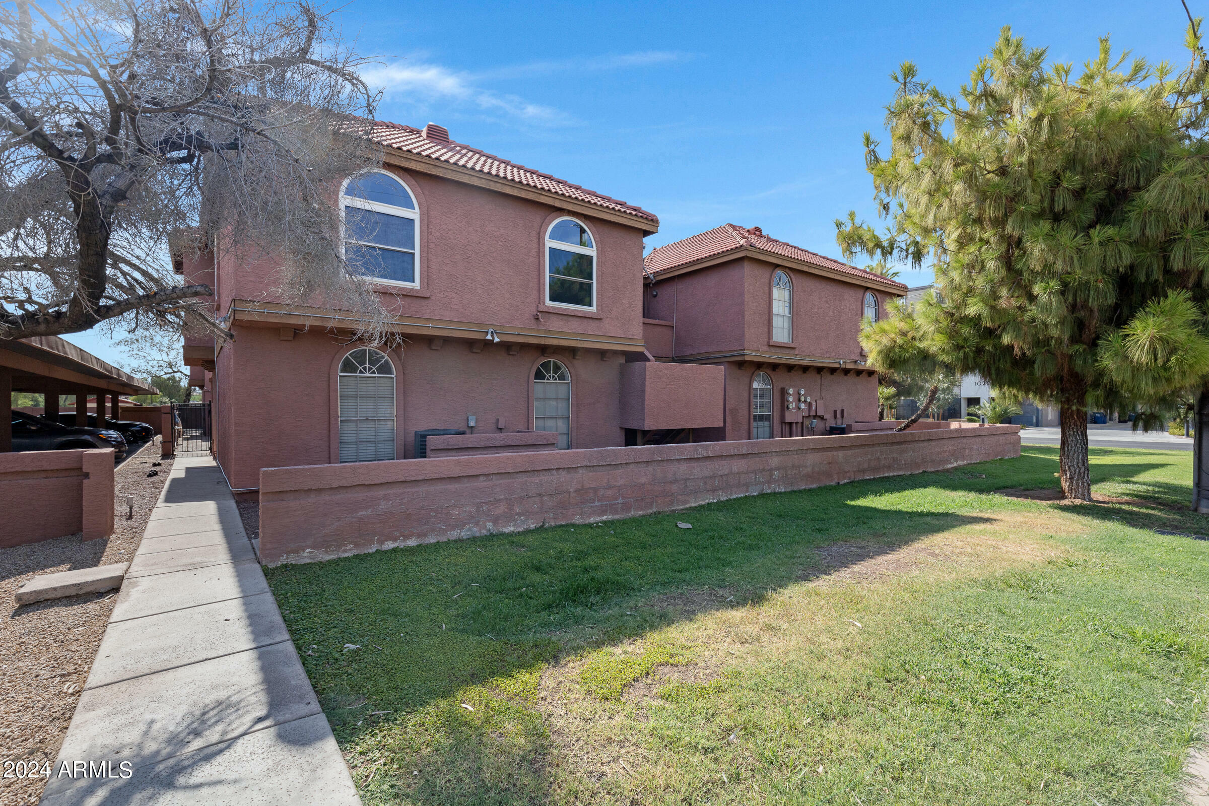 Property Photo: 1402 S Jentilly Lane 201 AZ 85281