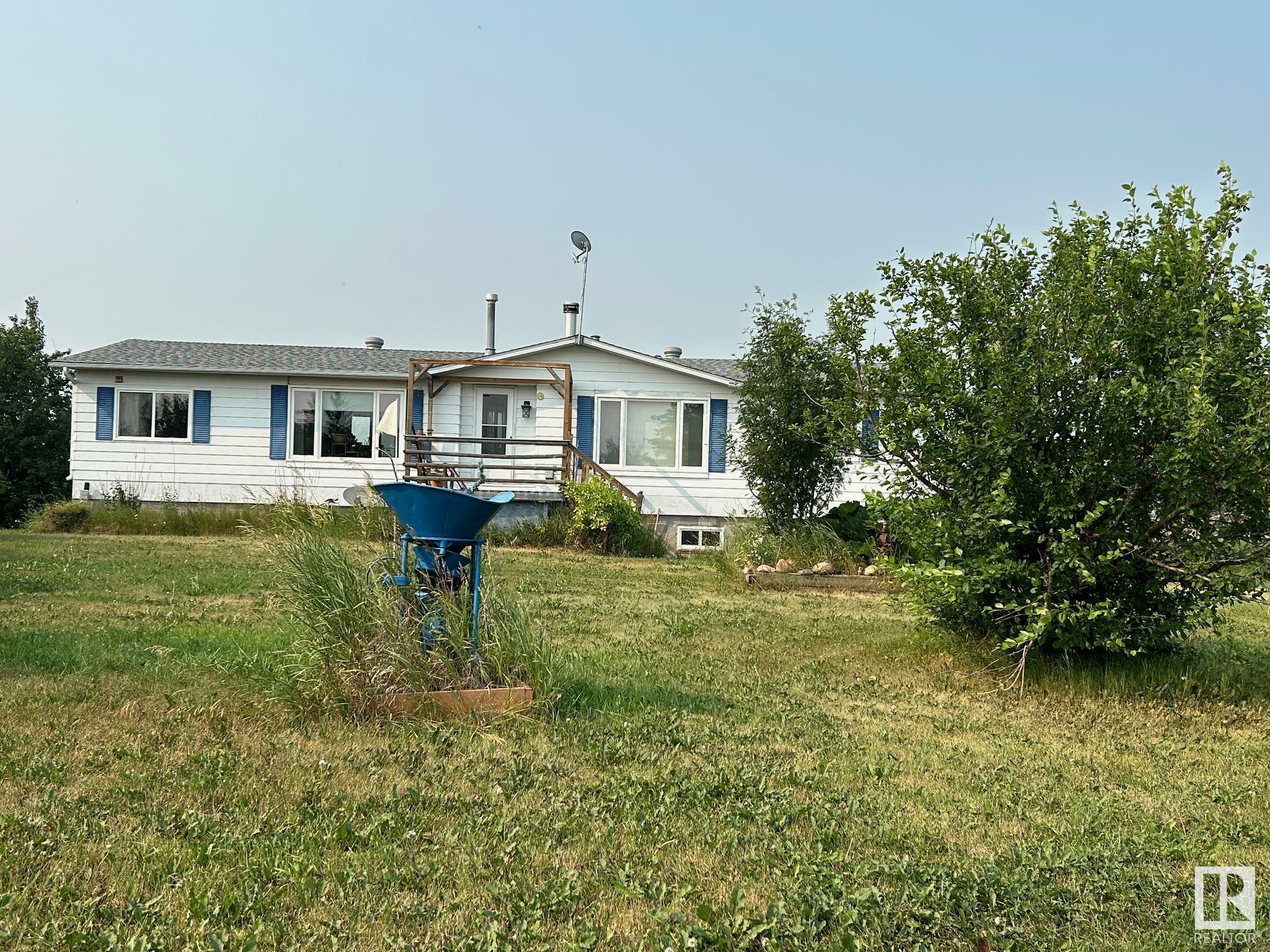 Property Photo:  59307 Hwy 63  AB T0A 3J0 