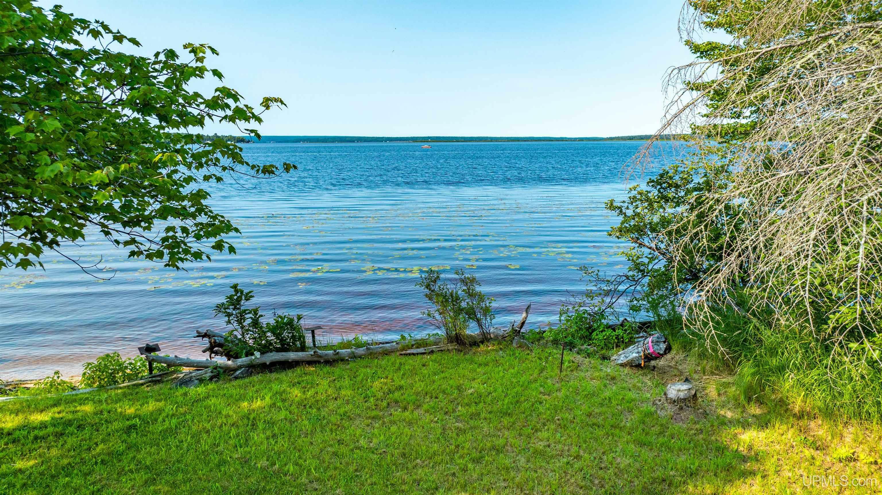 Property Photo:  41257 Half Moon Beach  MI 49916 