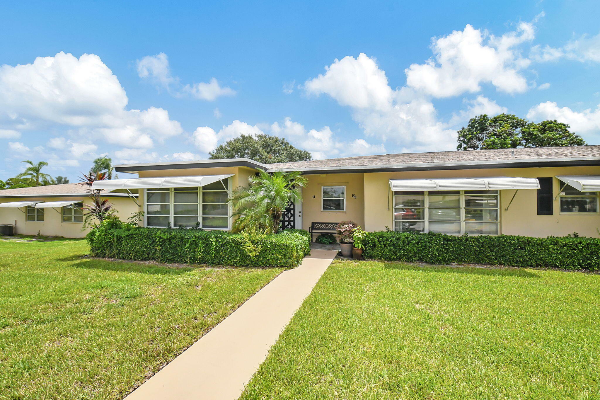 Property Photo:  875 North Drive Apt A  FL 33445 