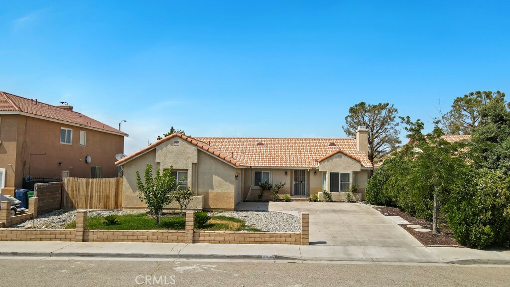 Property Photo:  5711 Opal Avenue  CA 93552 