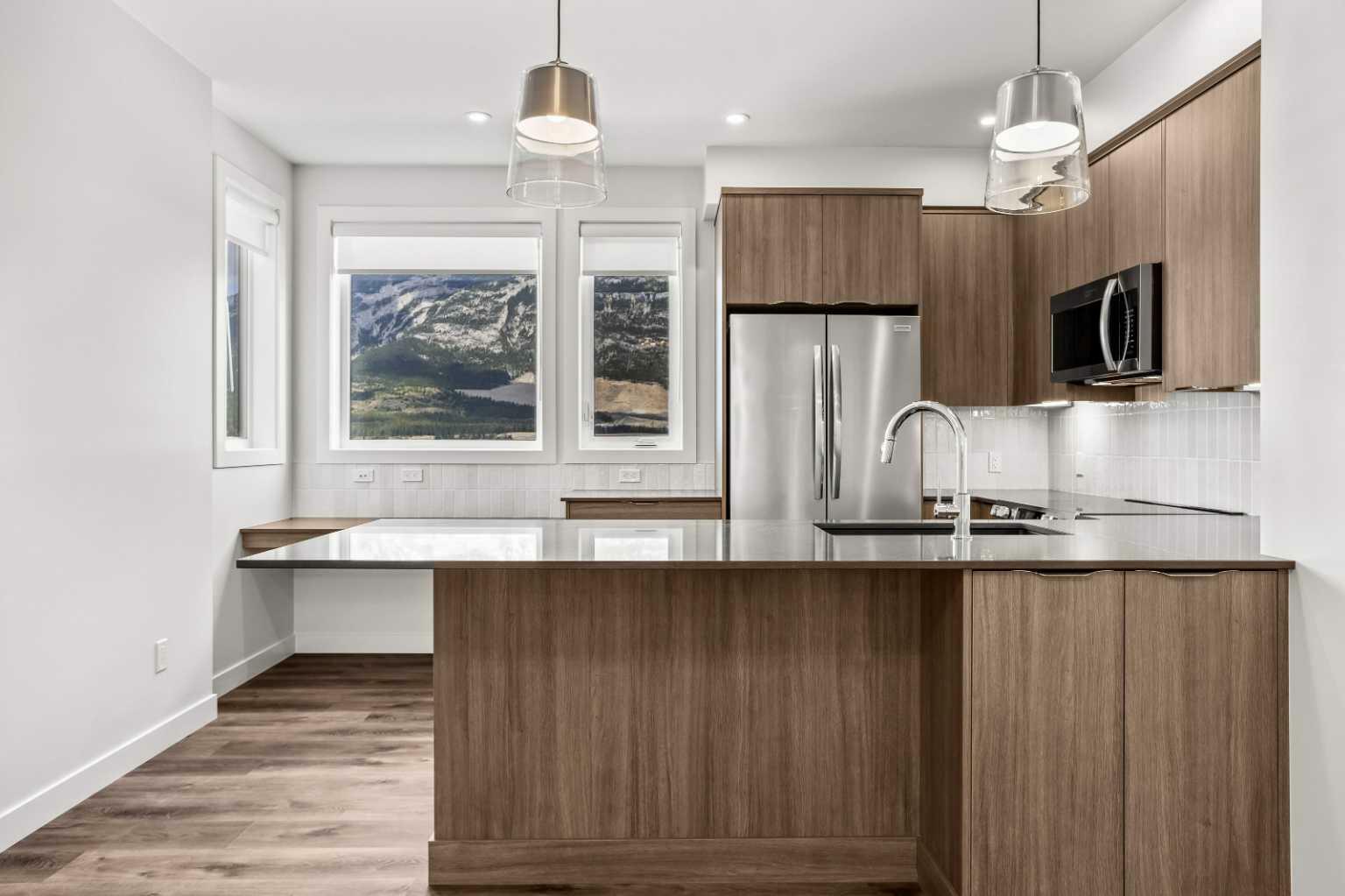 Photo de la propriété:  209 Stewart Creek Rise 201F  AB T1W 0G6 