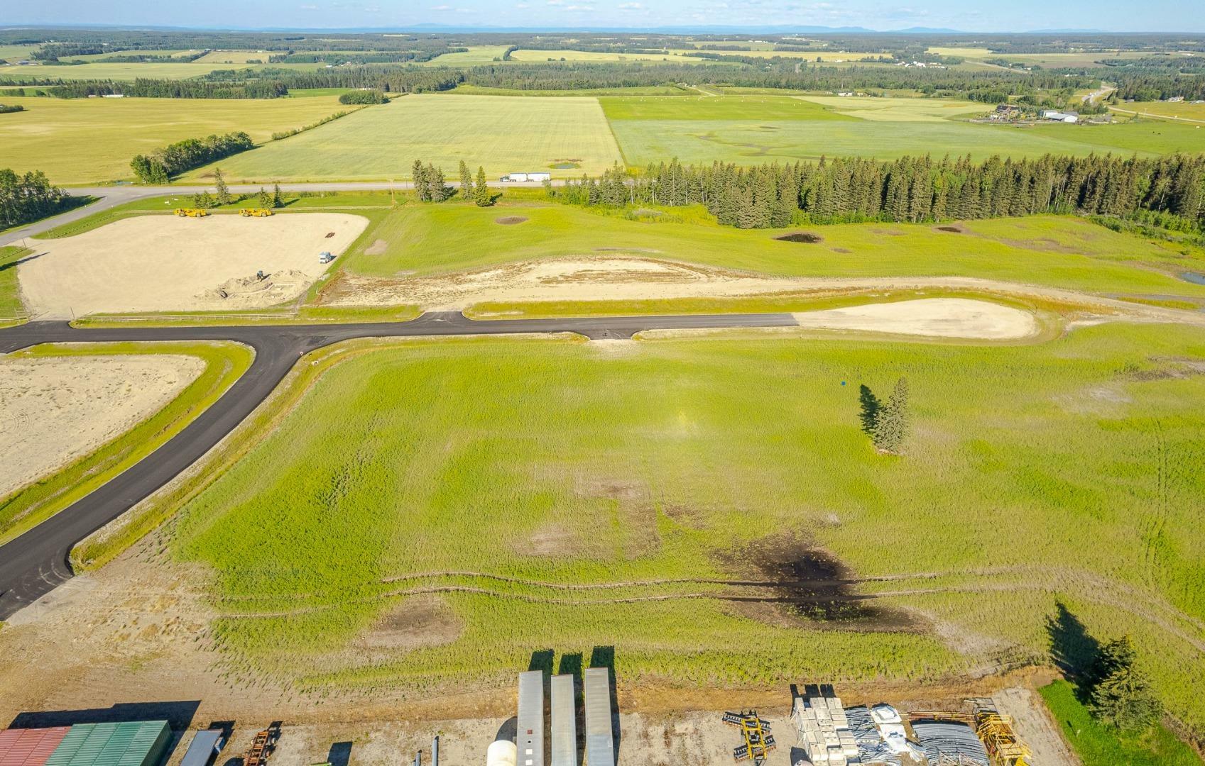 Property Photo:  #120-32532 Rr42  AB T0M 1X0 