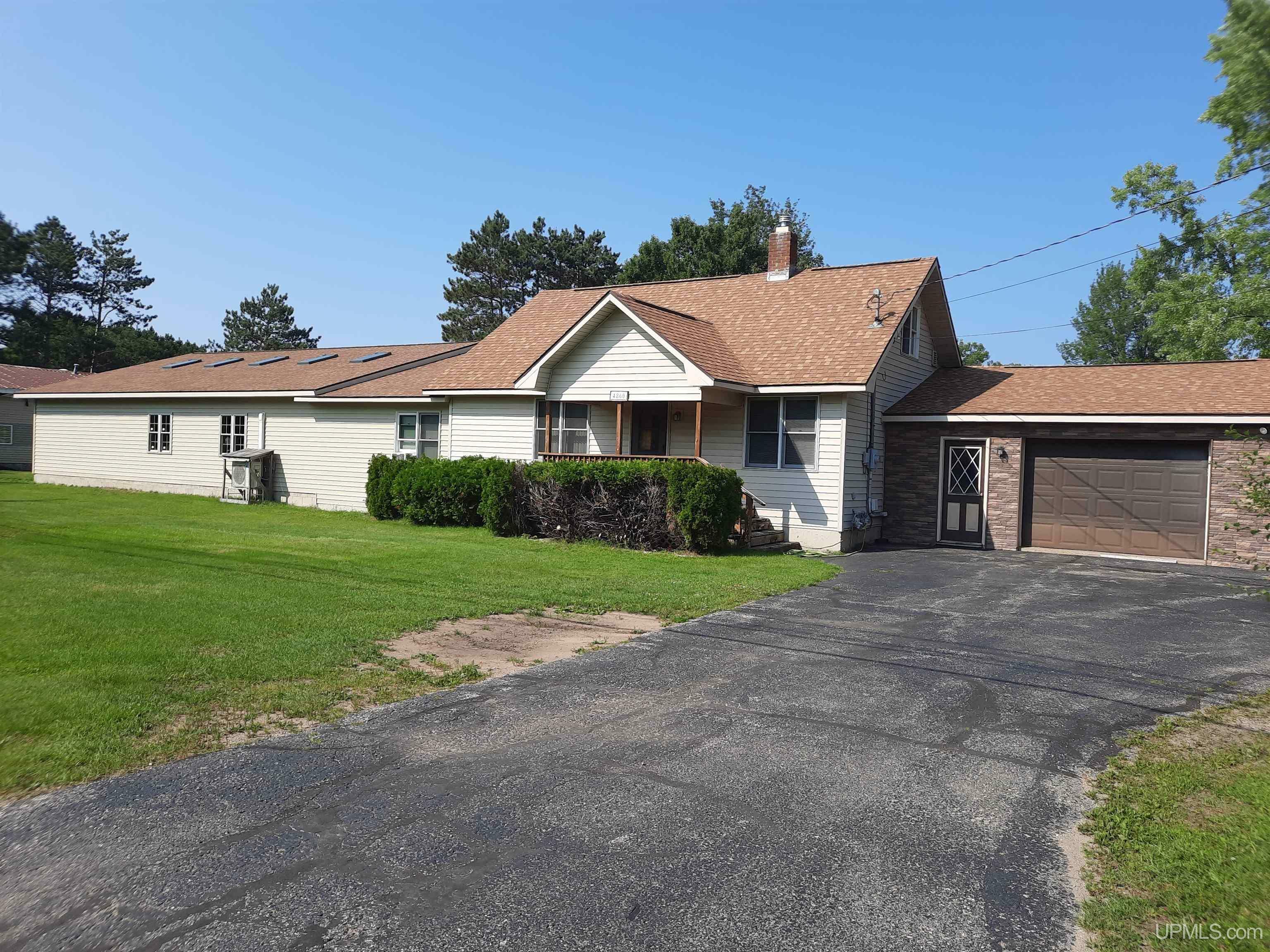 Property Photo:  4860 Danforth Road  MI 49829 