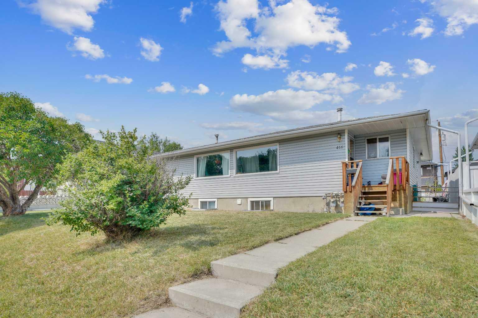 Property Photo:  416/416A/416B/414 54 Avenue SW  AB T2V 0C5 