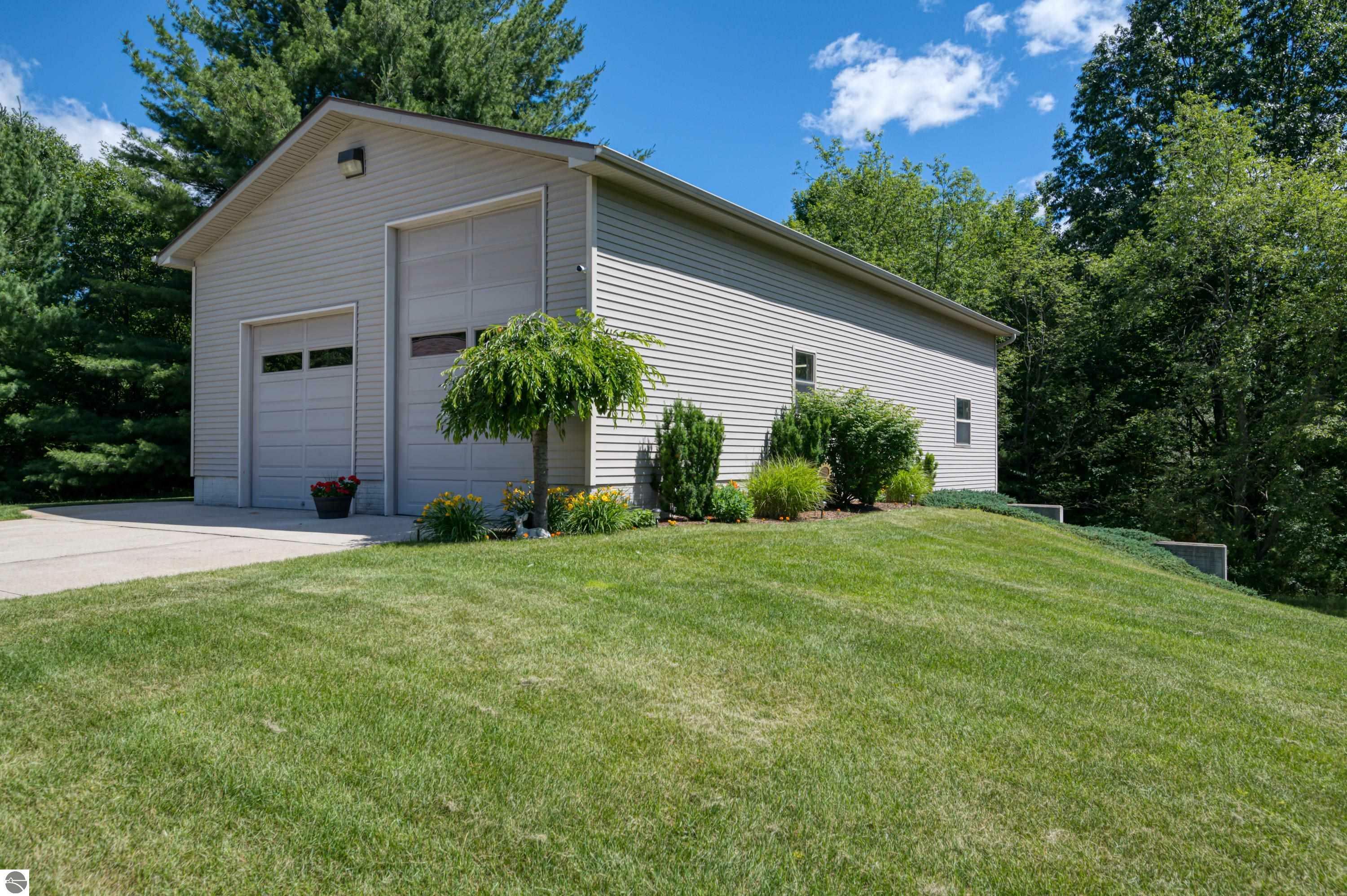 Property Photo:  1025 Bass Lake Road  MI 49685 