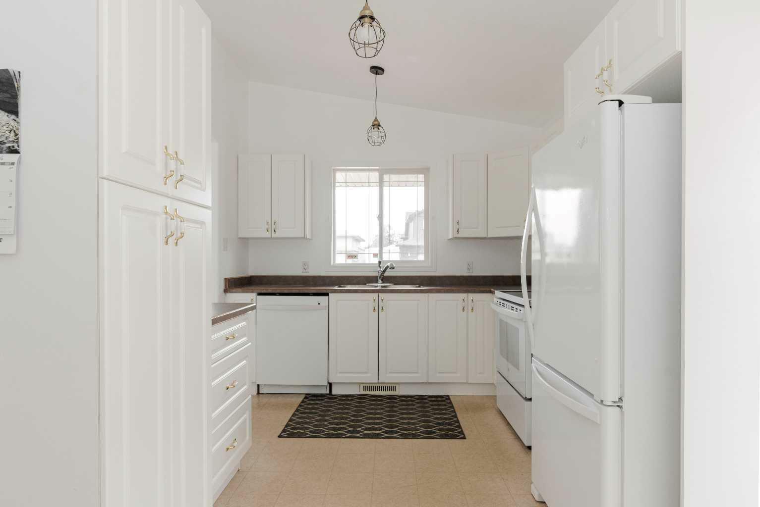 Property Photo:  152 Webb Drive  AB T9H 5H5 