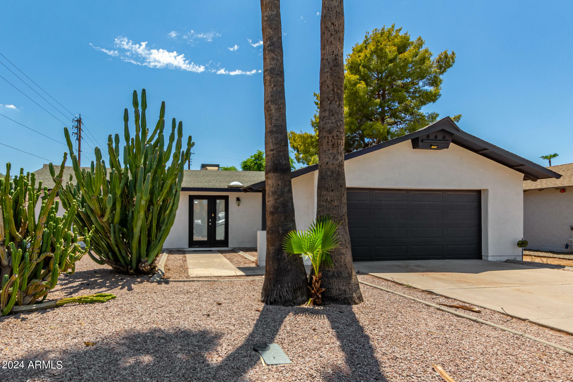 Property Photo:  8755 E Plaza Avenue  AZ 85250 