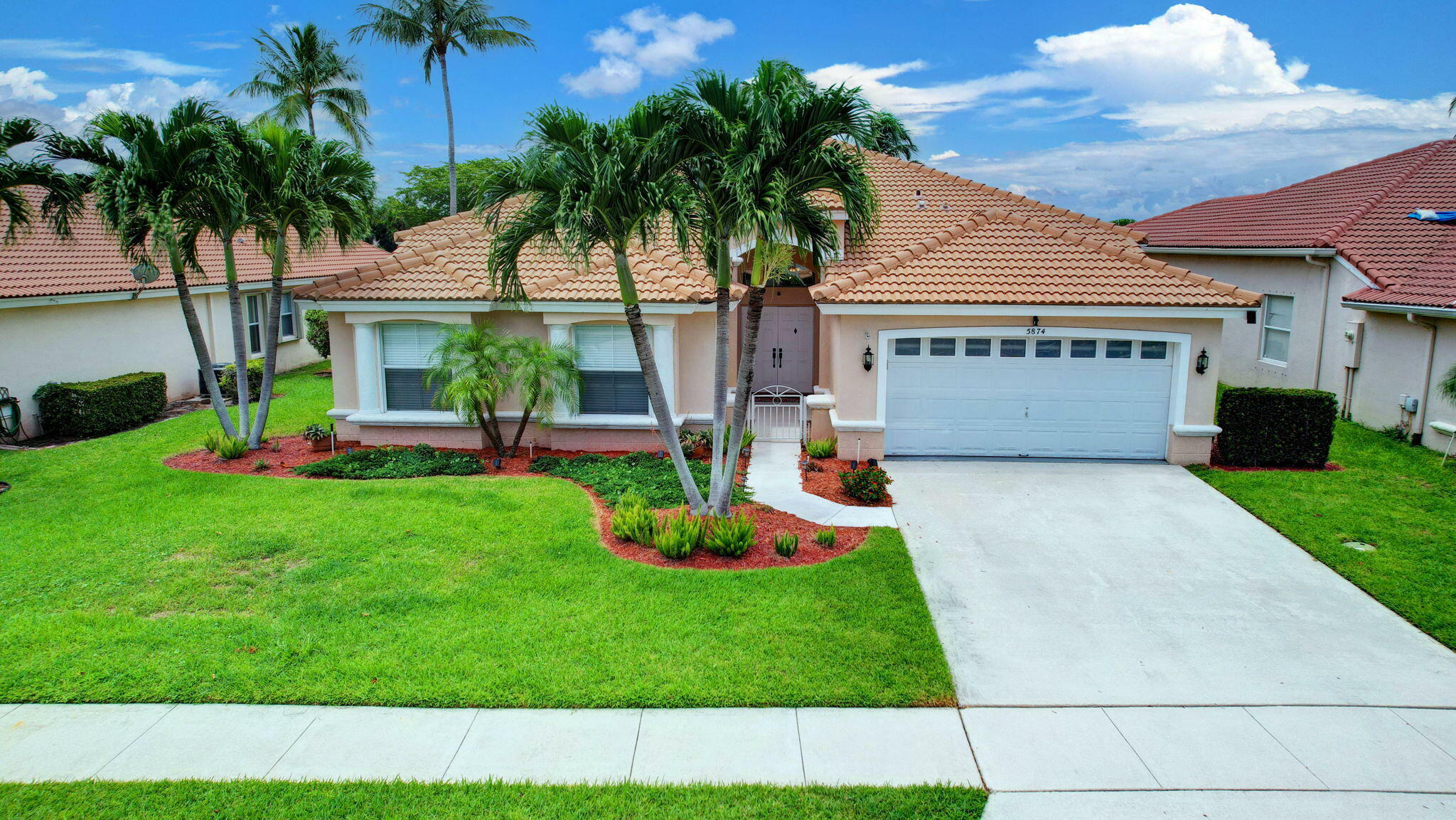 Property Photo:  5874 Las Colinas Circle  FL 33463 