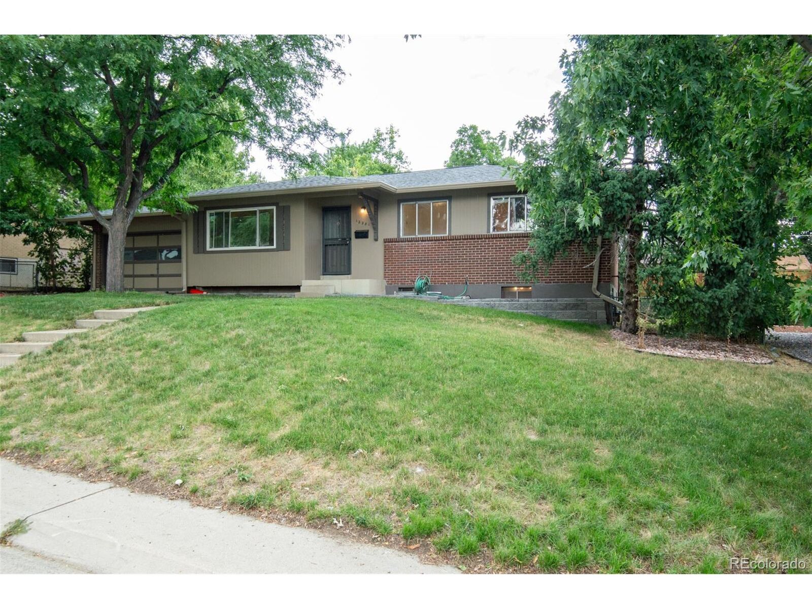 Property Photo: 12281 W Tennessee Pl CO 80228