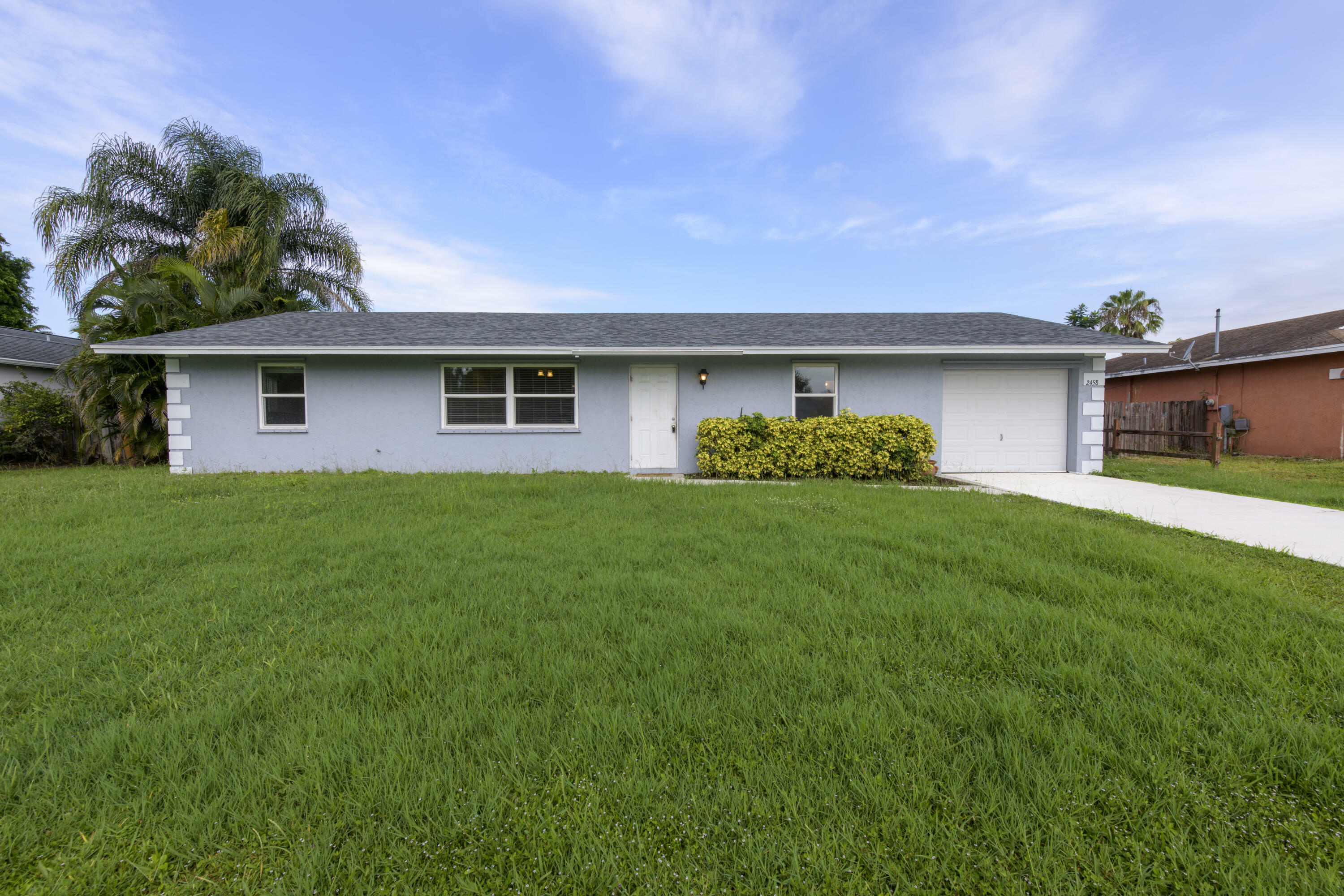 Property Photo:  2458 SW Hinchman Street  FL 34984 