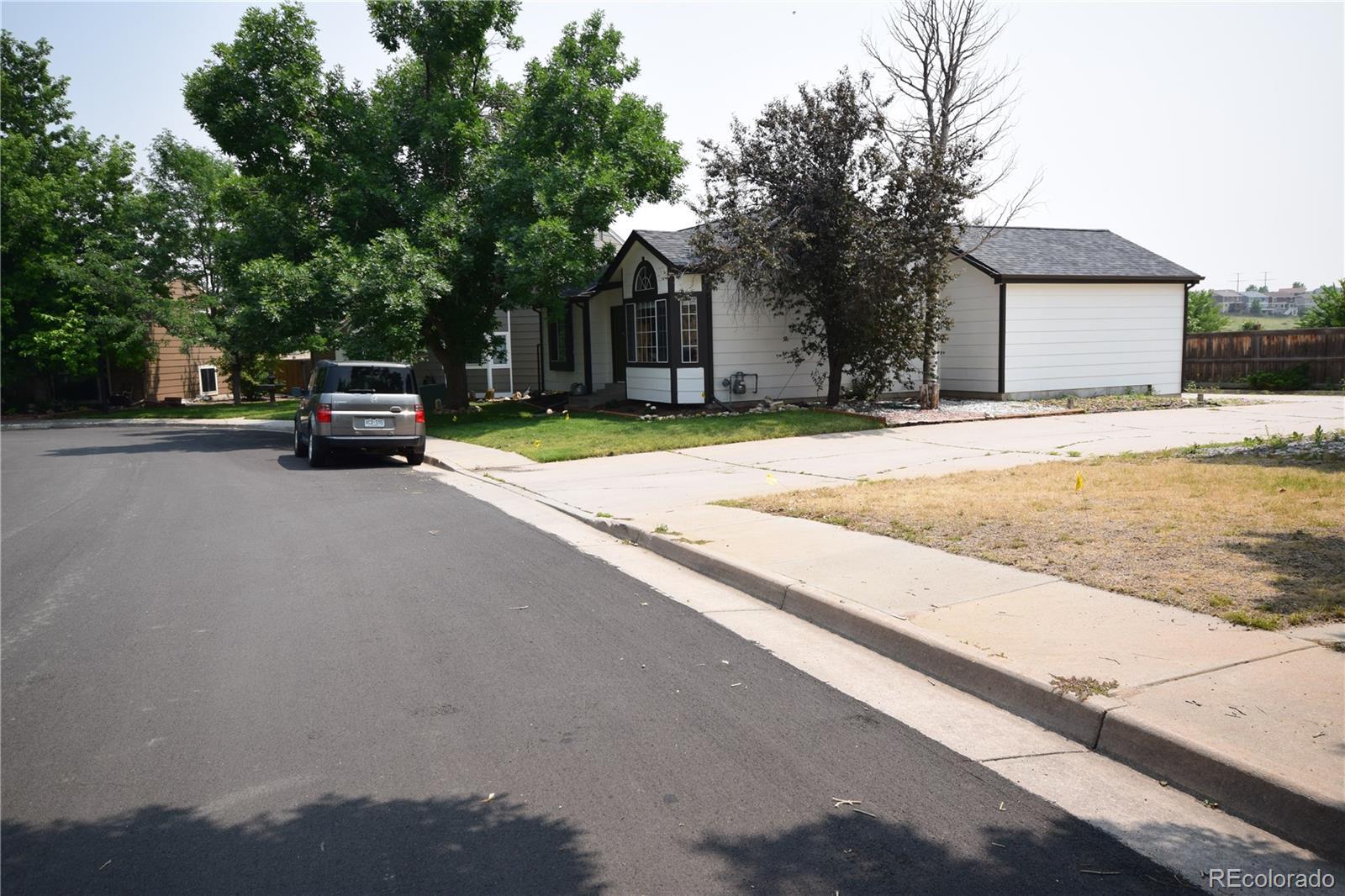 Property Photo:  207 S Quicksilver Avenue  CO 80104 