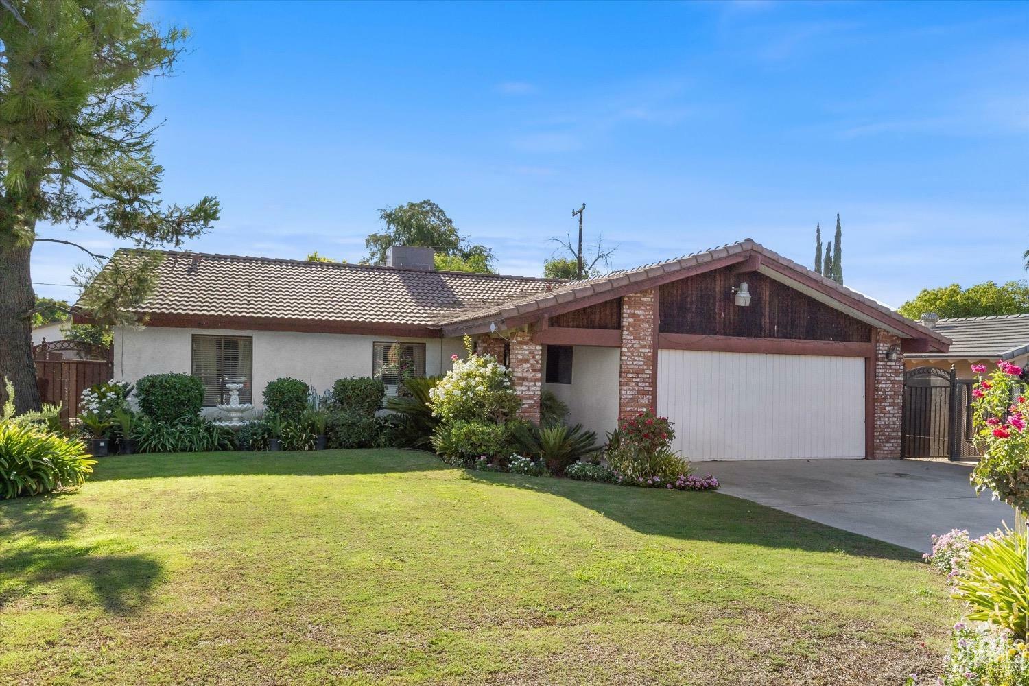 Property Photo:  8912 Lilly Street  CA 93241 