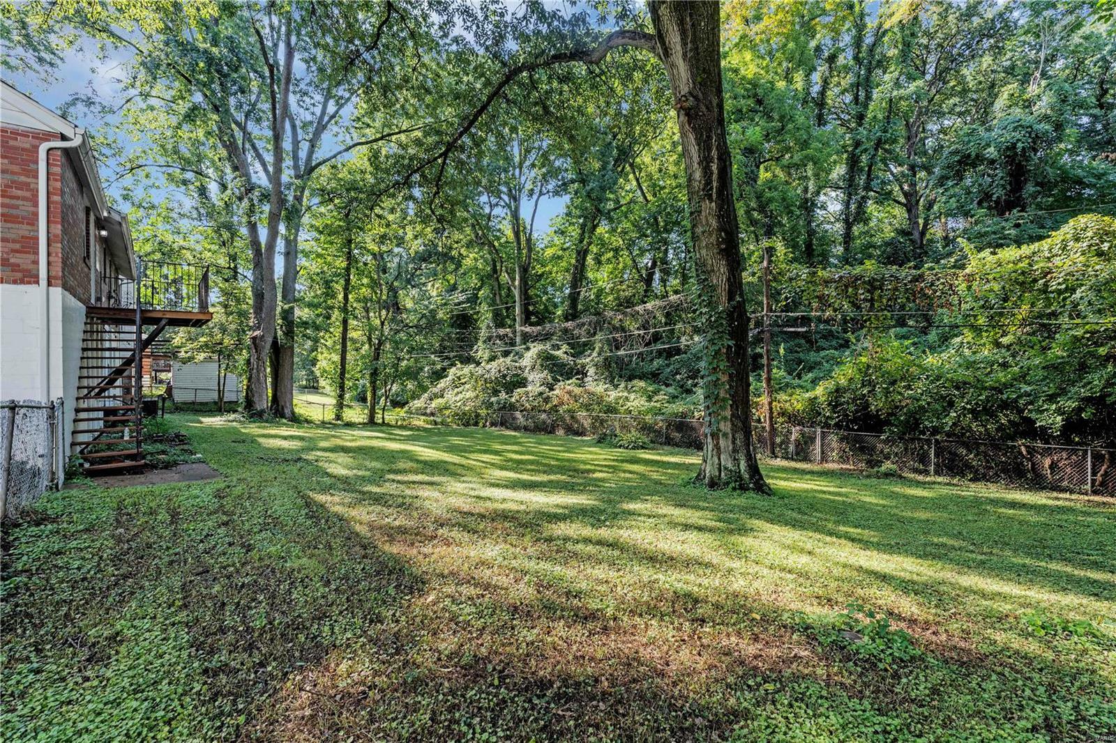 Property Photo:  7110 Roland Boulevard  MO 63121 