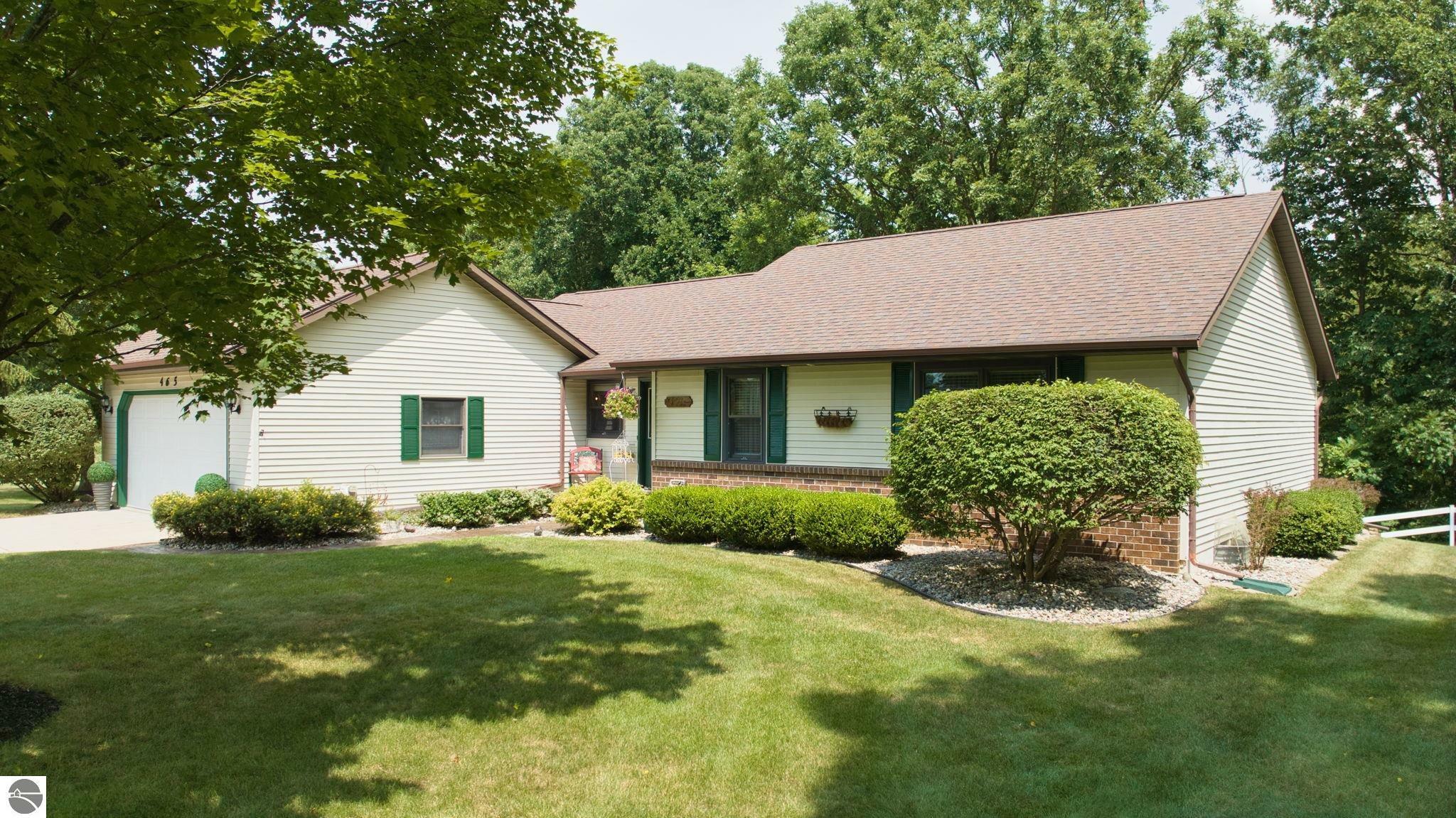 Property Photo:  465 Bluegrass Road  MI 48858 