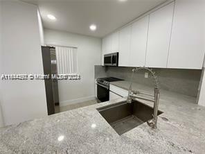 Property Photo:  7720 Camino Real E412  FL 33143 