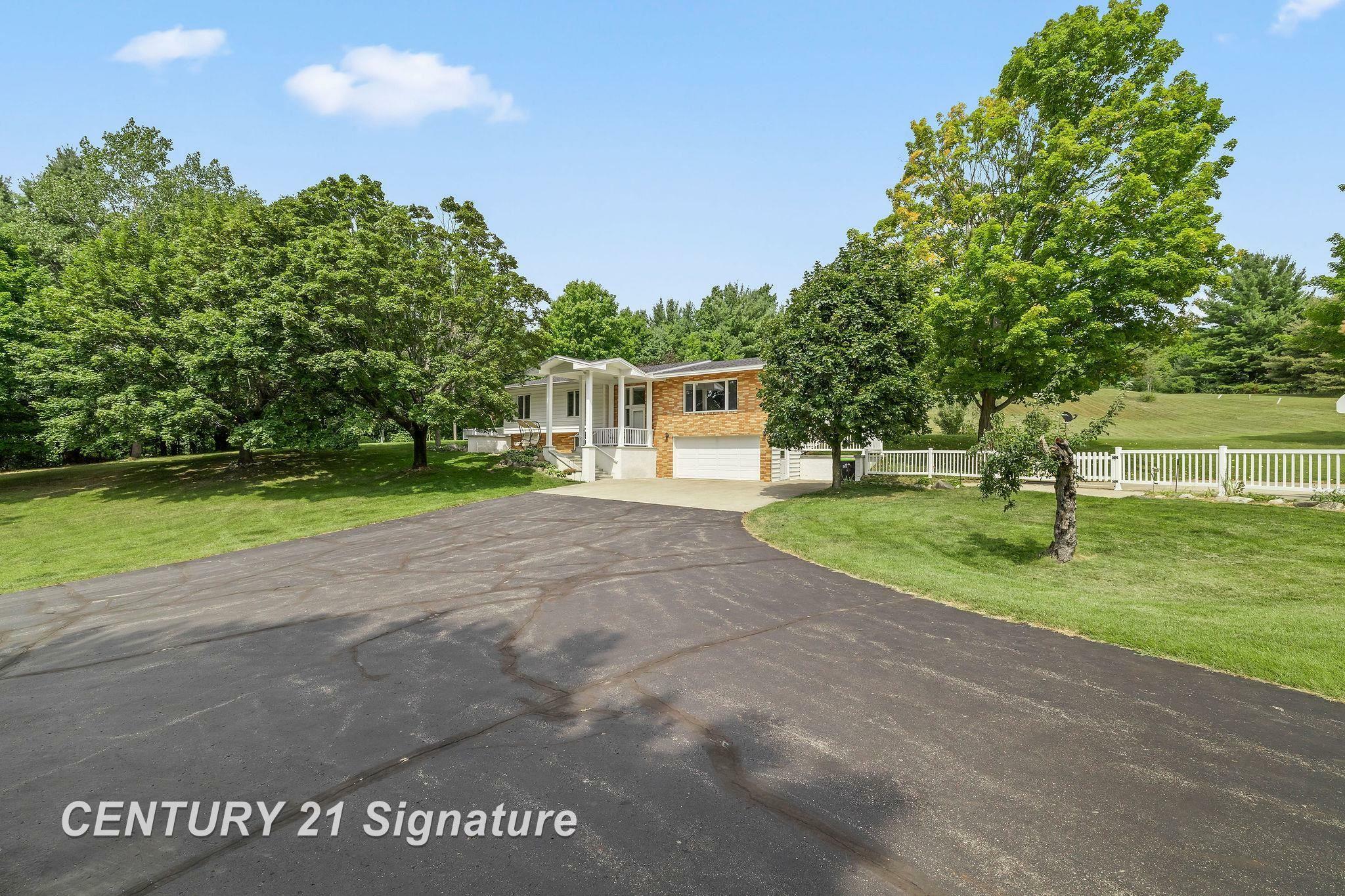 Property Photo:  9565 Alden  MI 49612 