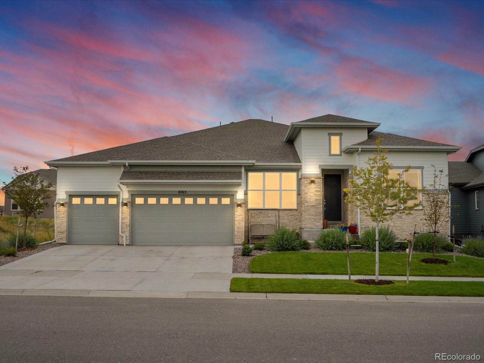 Property Photo: 8765 S Quemoy Street CO 80016