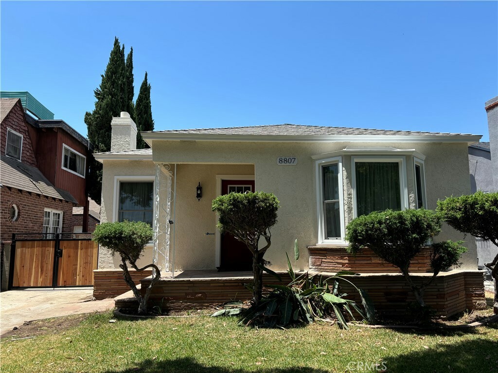 Property Photo:  8807 Cimarron Street  CA 90047 