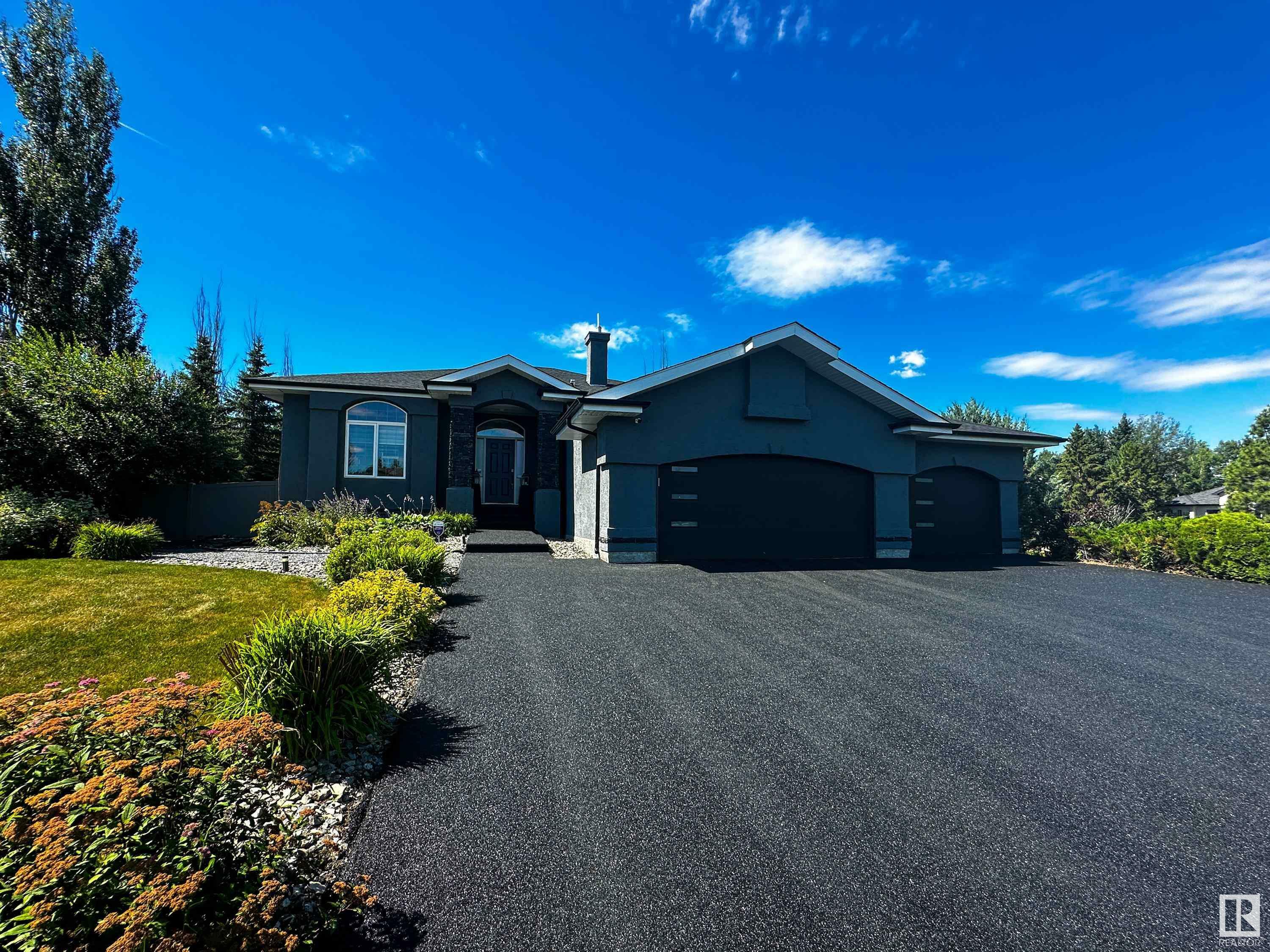 Property Photo:  53302 Rge Rd 261 141  AB T7Y 1A7 