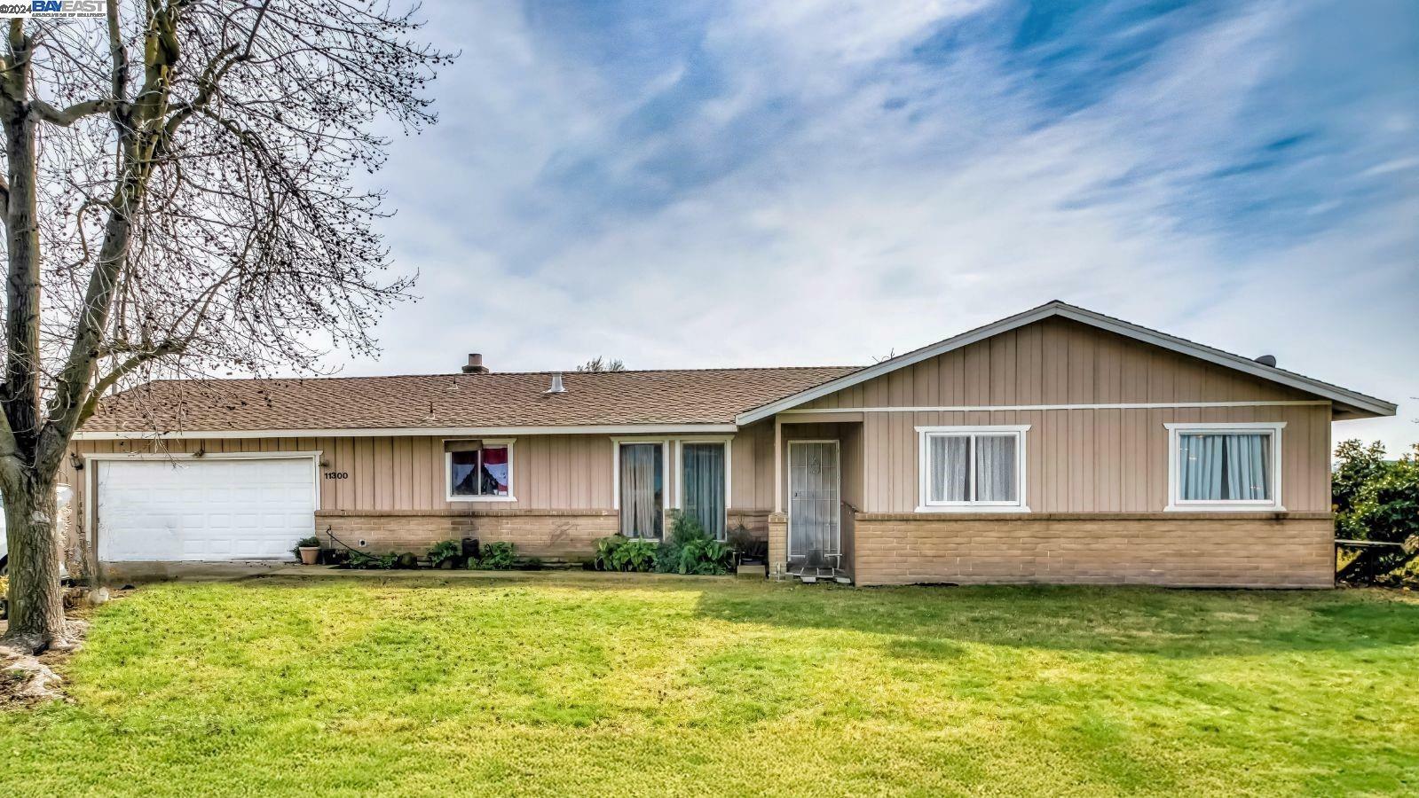 Property Photo:  11300 Claribel Rd.  CA 95361 