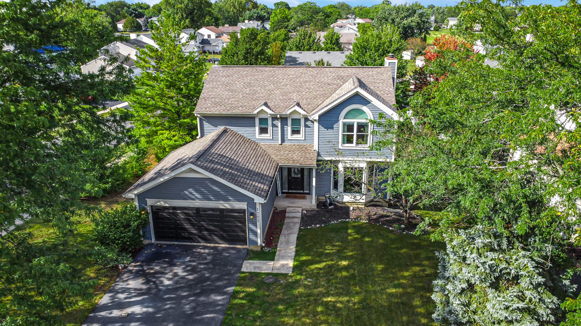 Property Photo:  1221 Saratoga Drive  IL 60188 