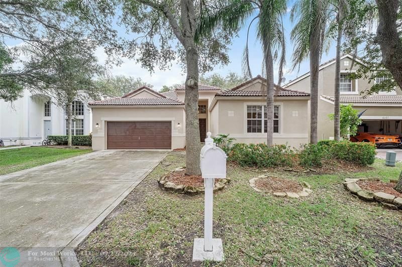 Property Photo:  6319 NW 80th Dr  FL 33067 