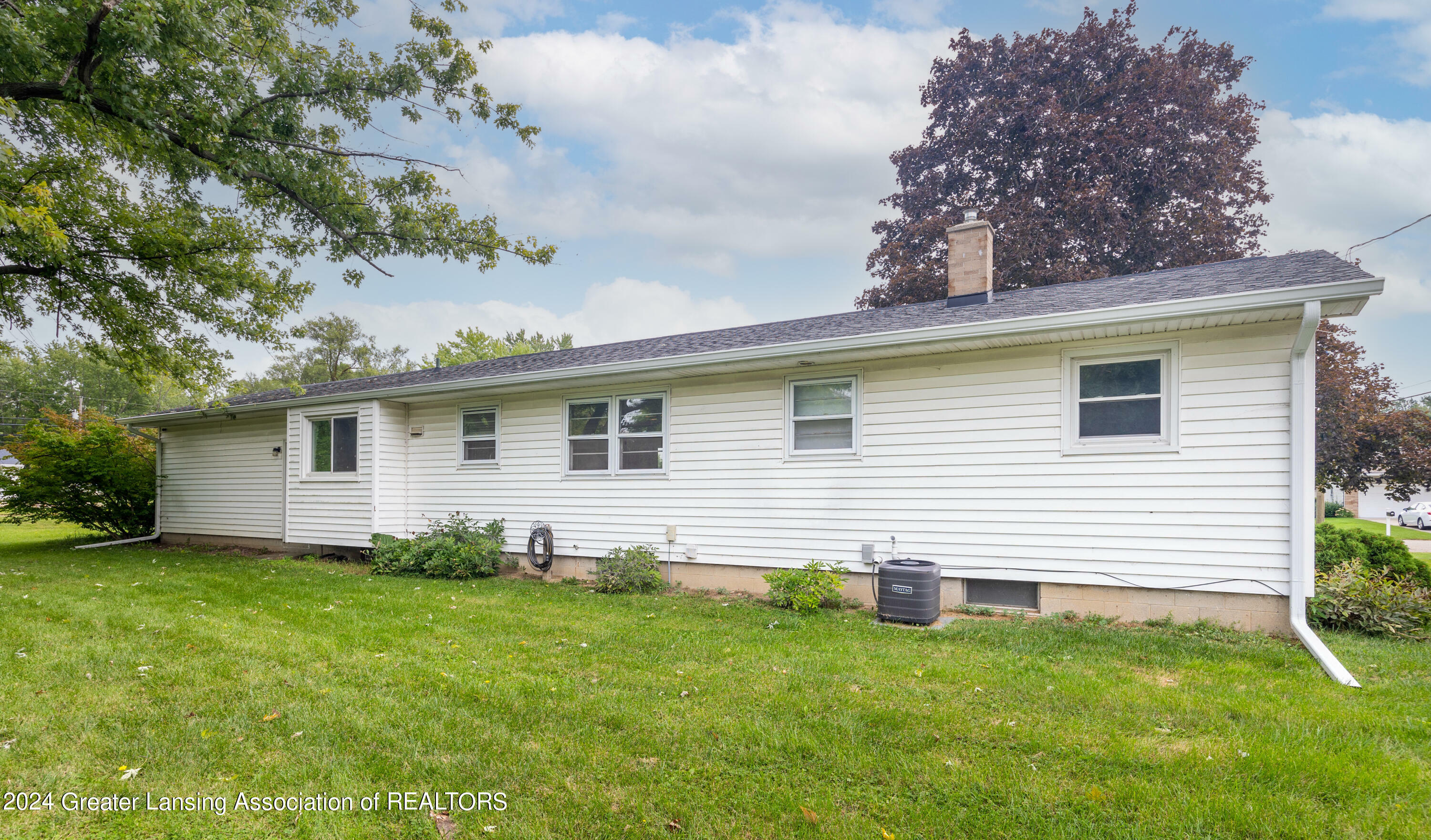 Property Photo:  706 Arbor Vitae Drive  MI 48917 