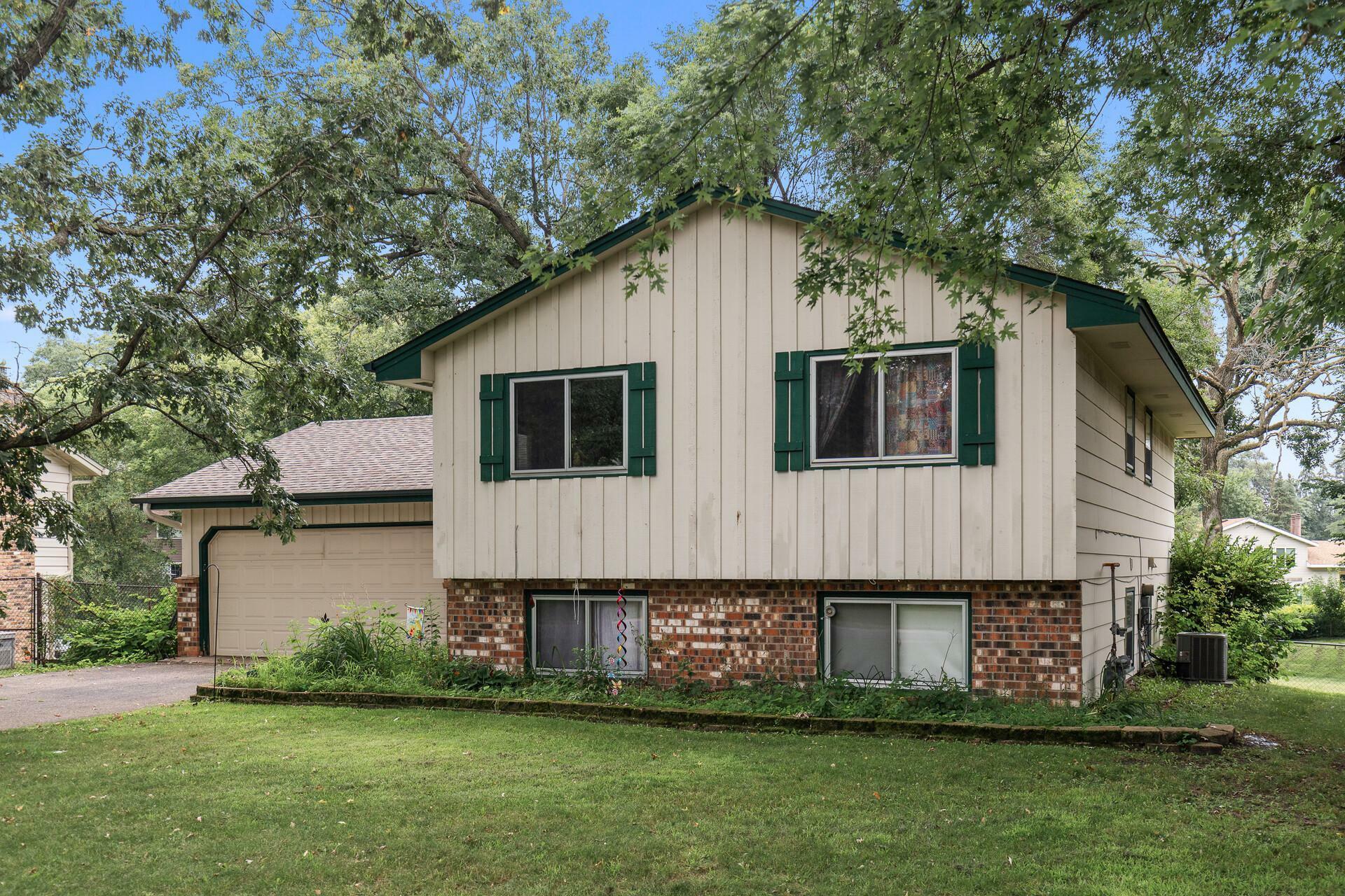 Property Photo:  748 129th Avenue NE  MN 55434 