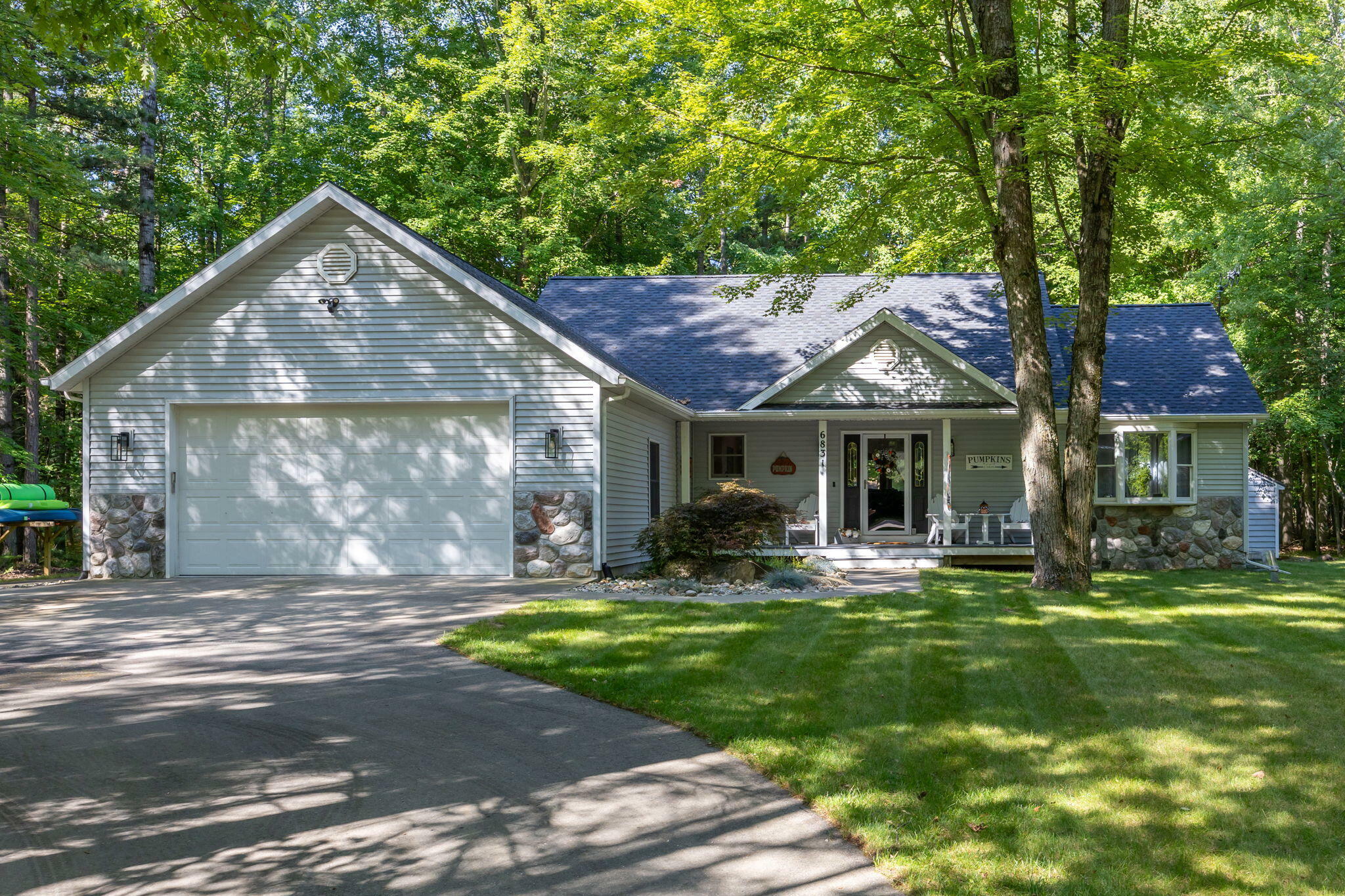 Property Photo:  6831 White Pine Drive  MI 49346 