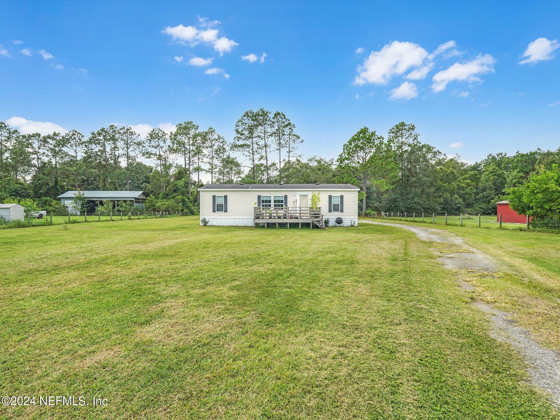 Property Photo:  12476 SW 70th Avenue  FL 32091 