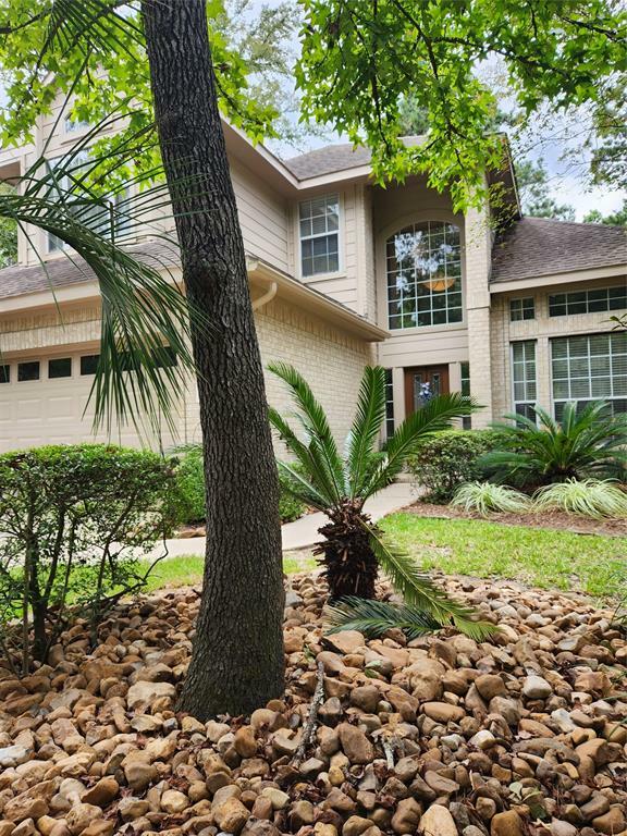 Property Photo:  6 S Willow Point Circle  TX 77382 