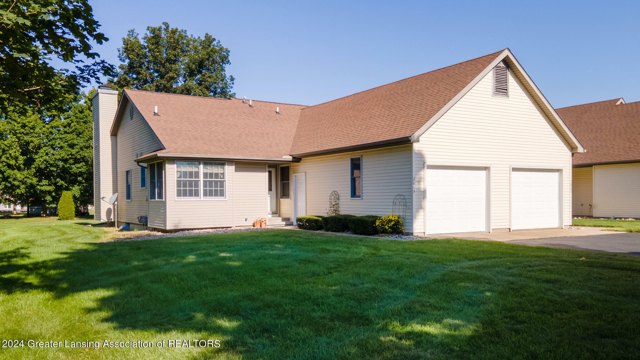 Property Photo:  2863 Twelve Oaks Drive  MI 48813 