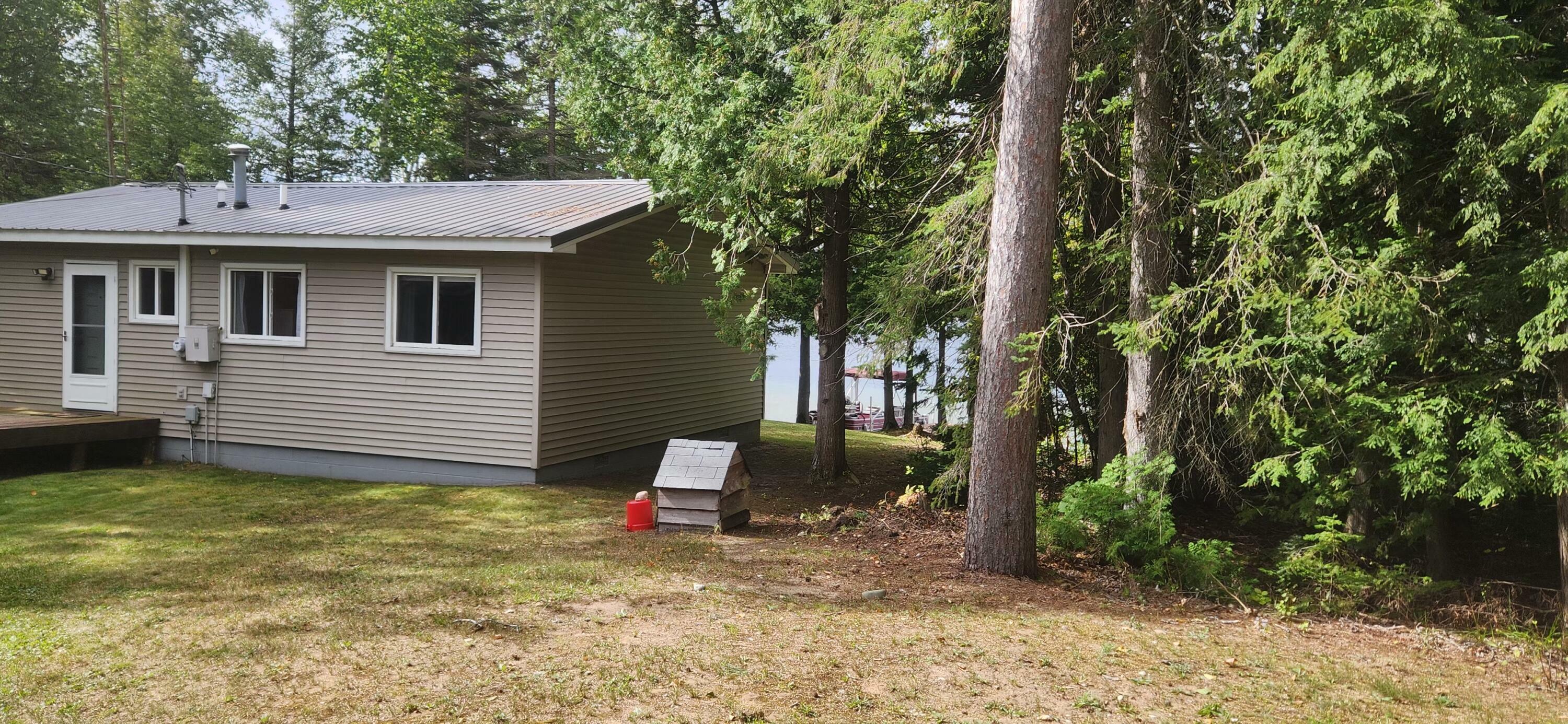 Property Photo:  9828 Loons Nest  MI 49721 