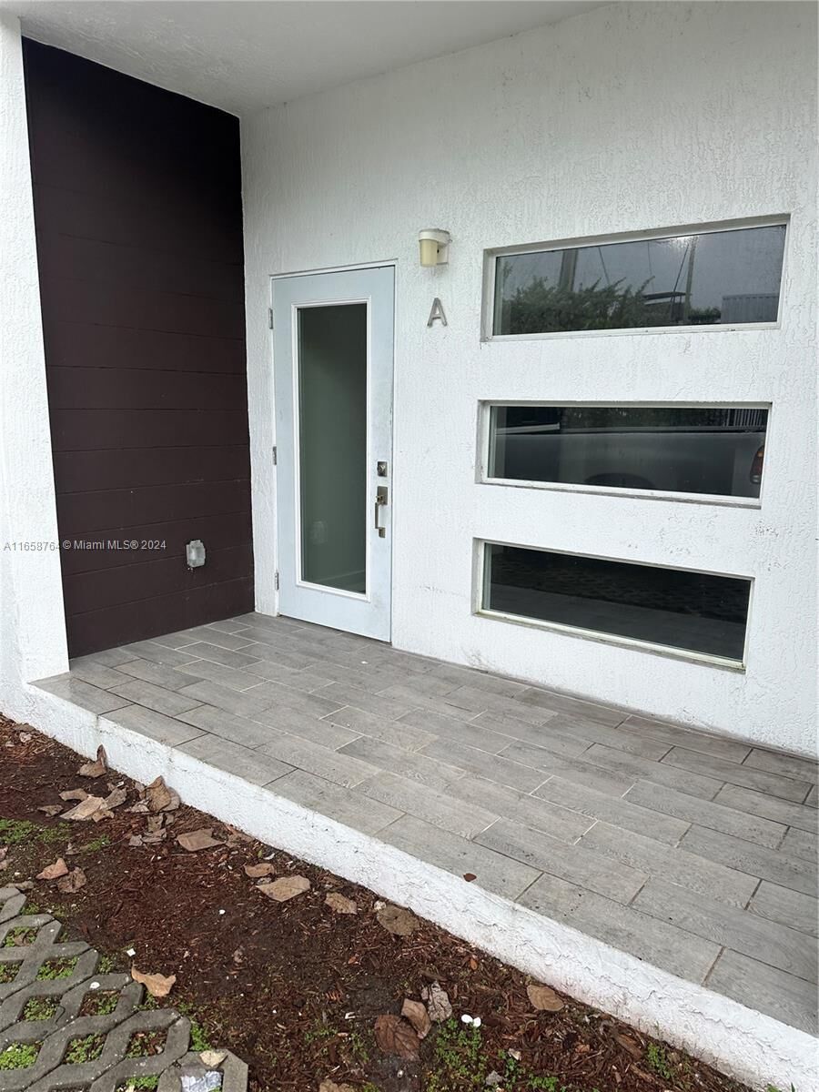 Property Photo: 224 NW 57th St B FL 33127