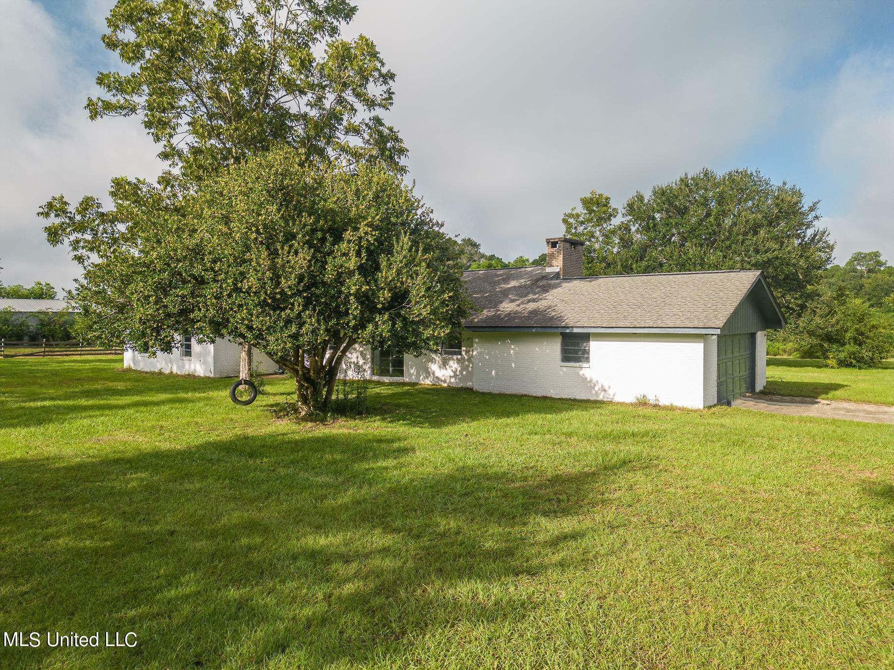 Property Photo:  20668 Mennonite Road  MS 39503 