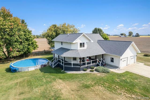 Property Photo:  8206 N McCaffrey Road  MI 48867 