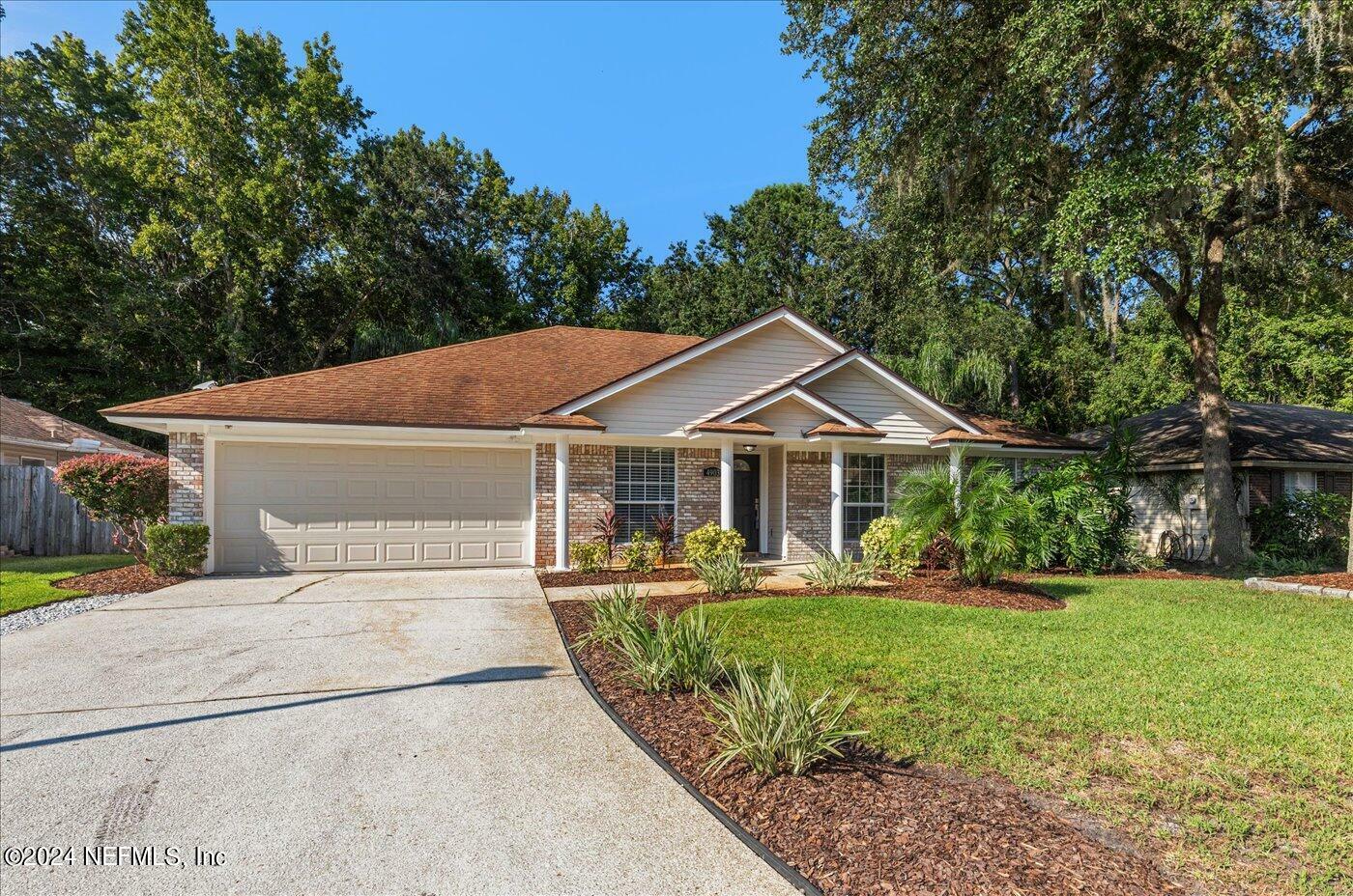 Property Photo:  4903 Greenland Hideaway Drive N  FL 32258 