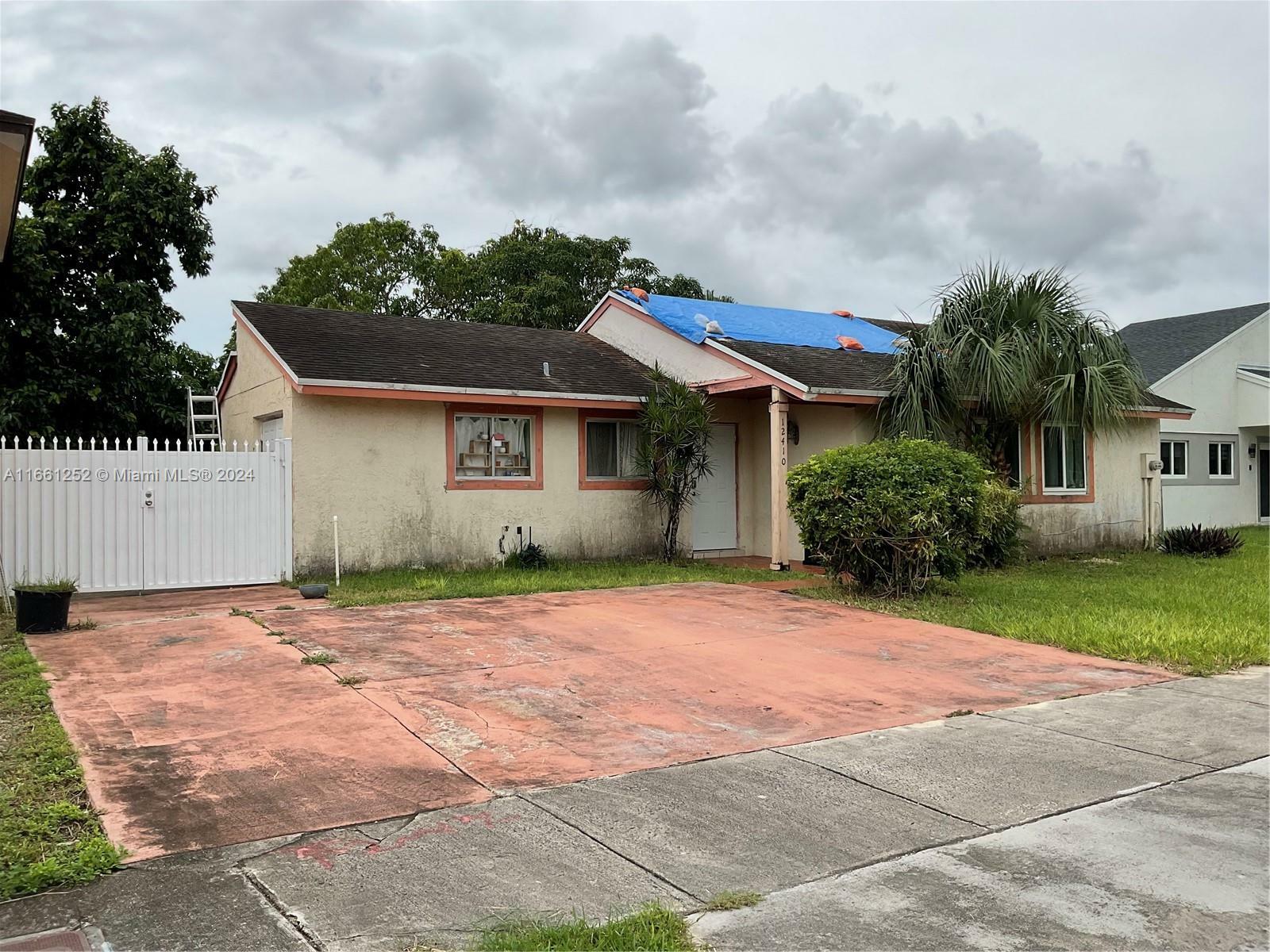 Property Photo:  12410 SW 203rd St  FL 33177 