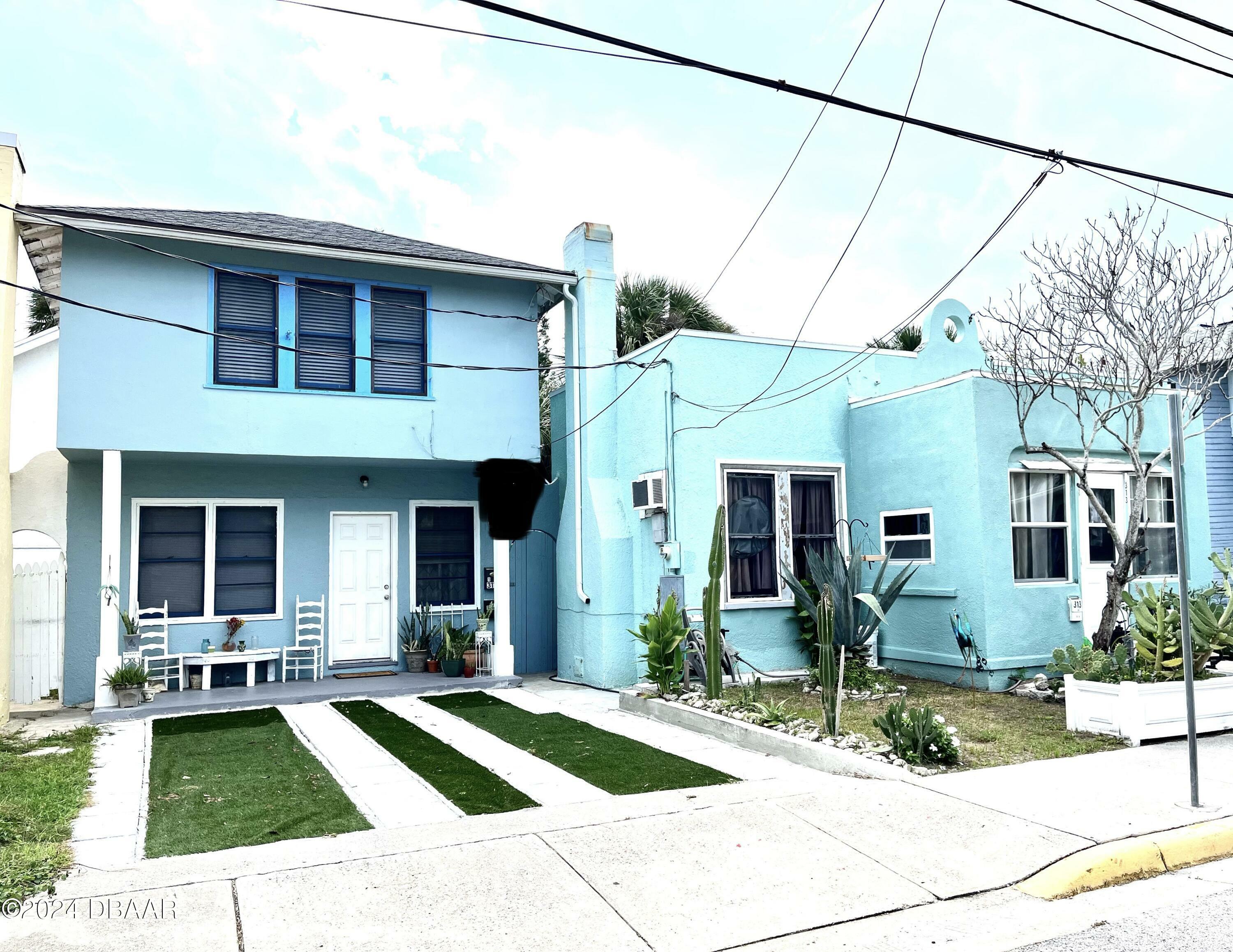 Property Photo: 311-313 N Oleander Avenue FL 32118