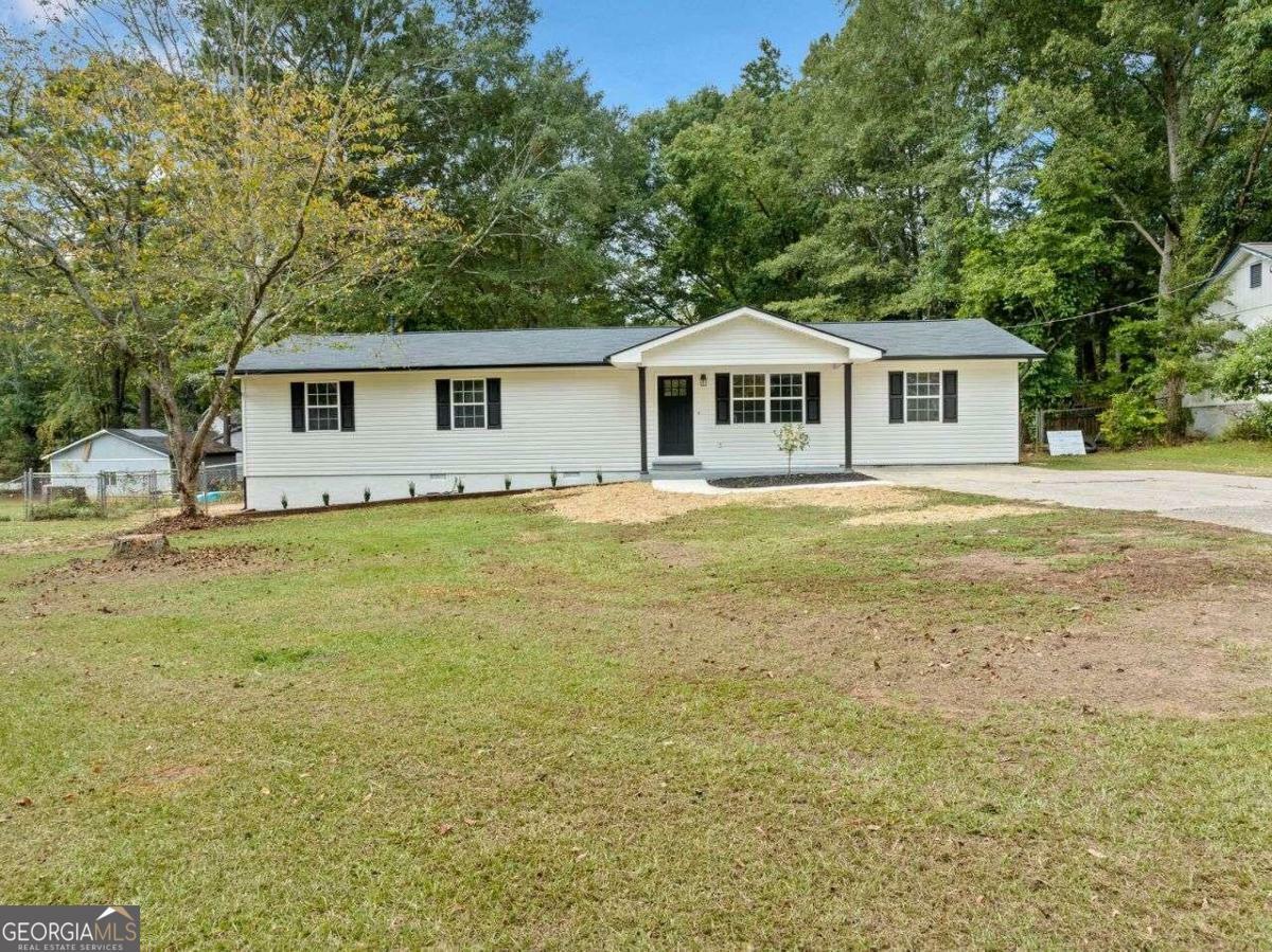 Property Photo:  302 Davis Road  GA 30281 