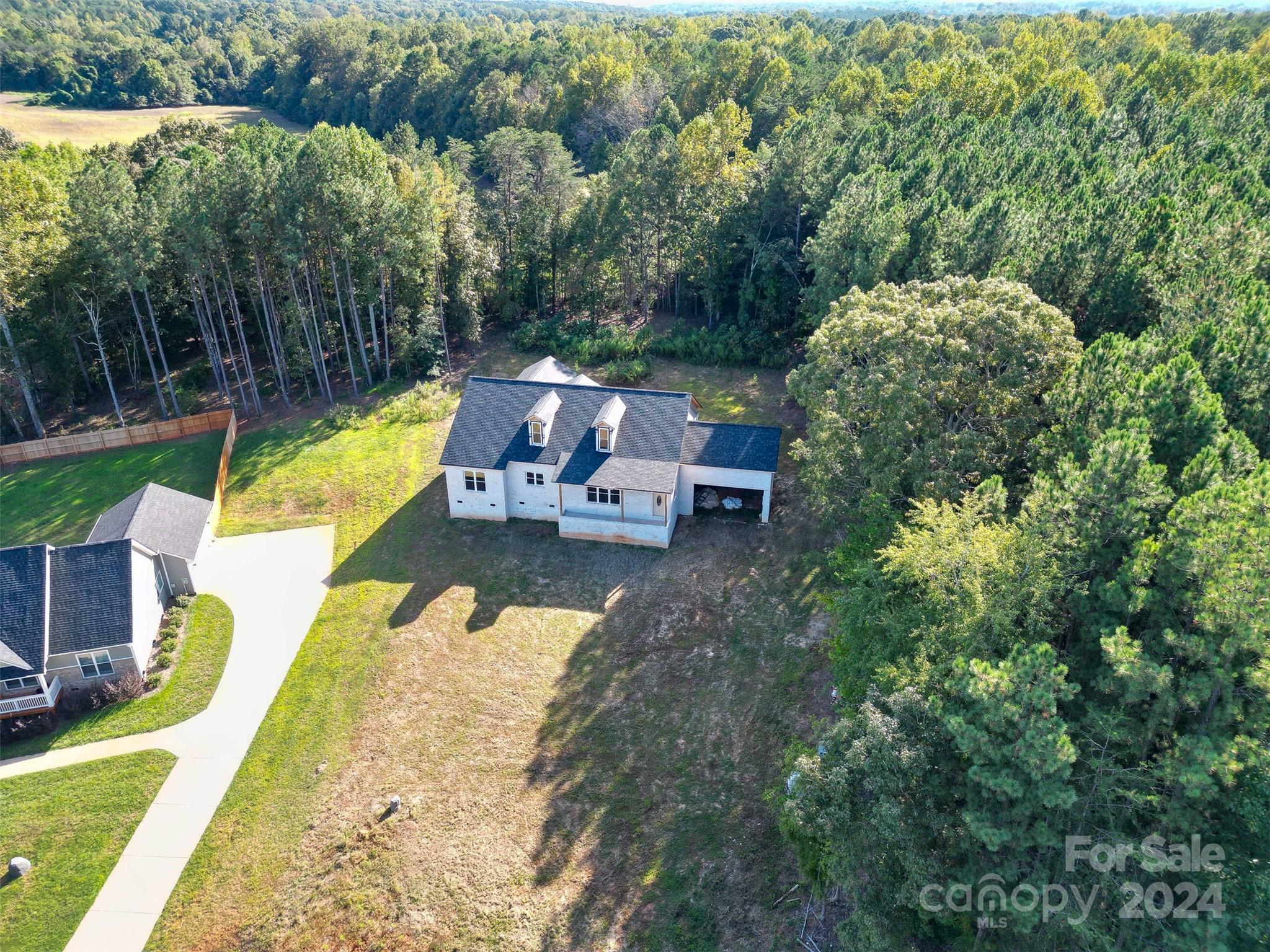 Property Photo:  9033 Wagon Trail  NC 28092 