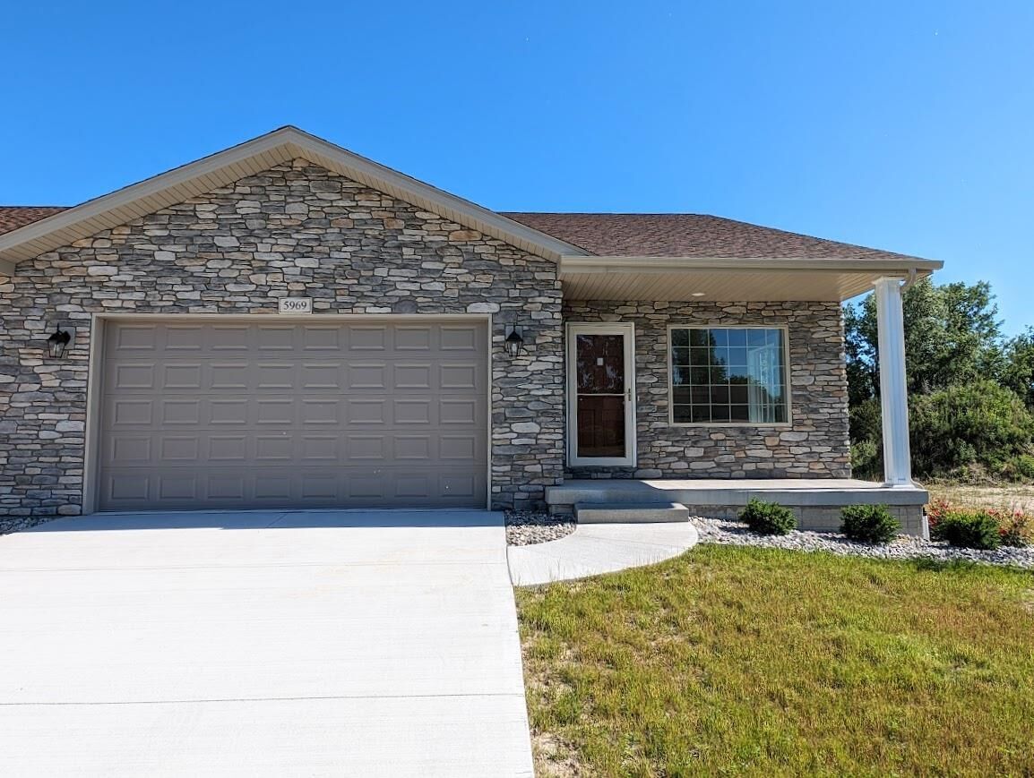 Property Photo:  5973 Faith Boulevard  MI 48706 