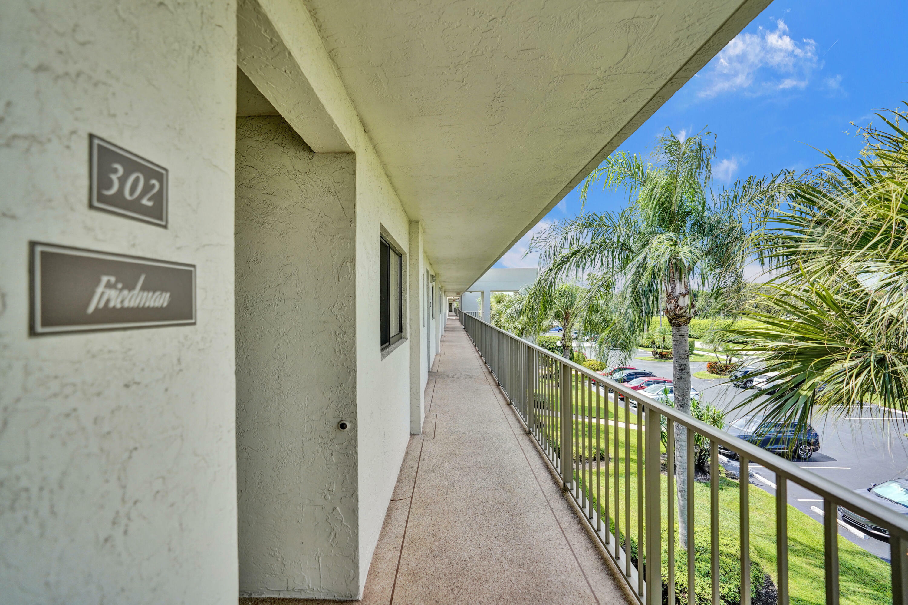 Property Photo:  5574 Witney Drive 302  FL 33484 