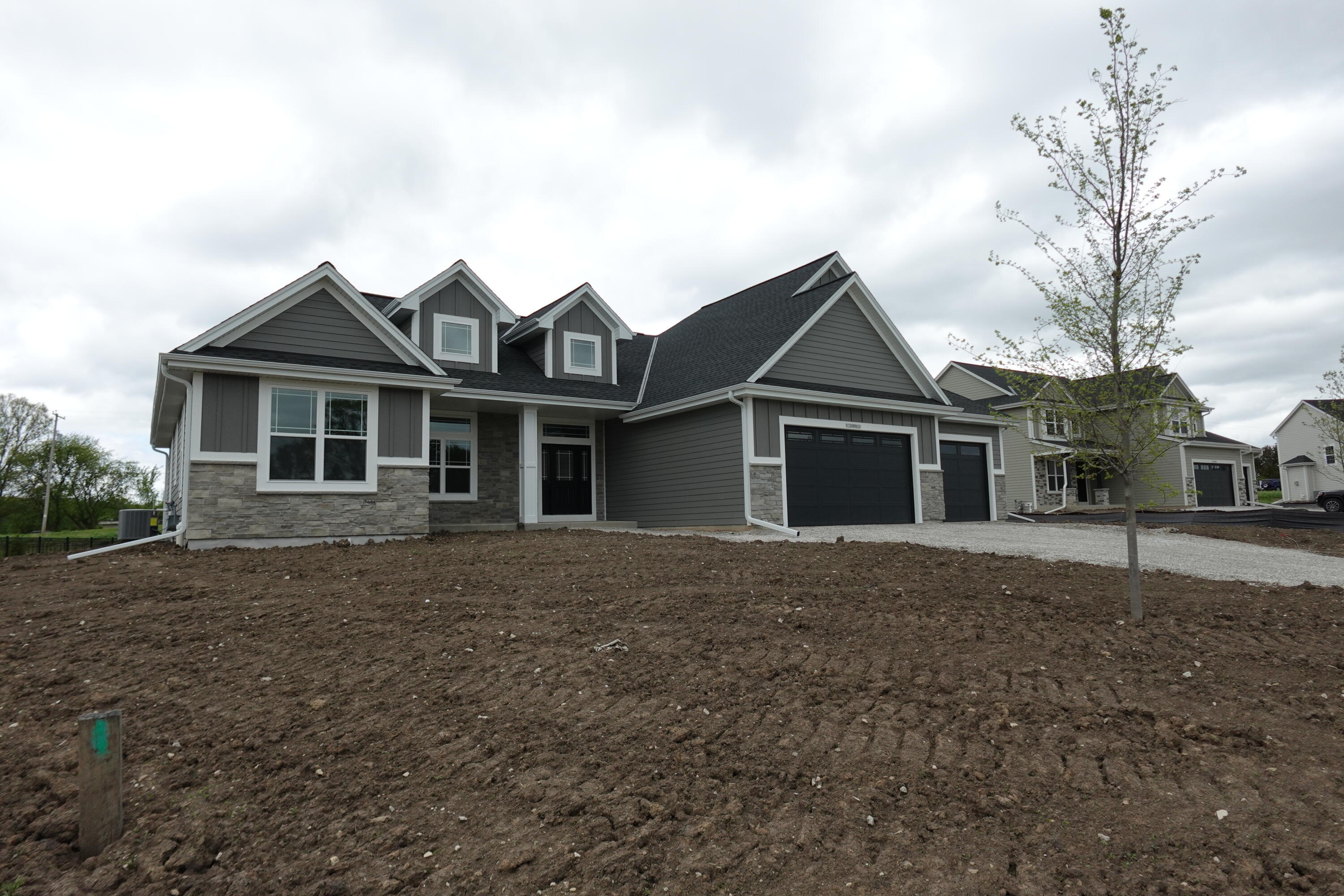 Property Photo: W130s8620 Muscovy Way WI 53150